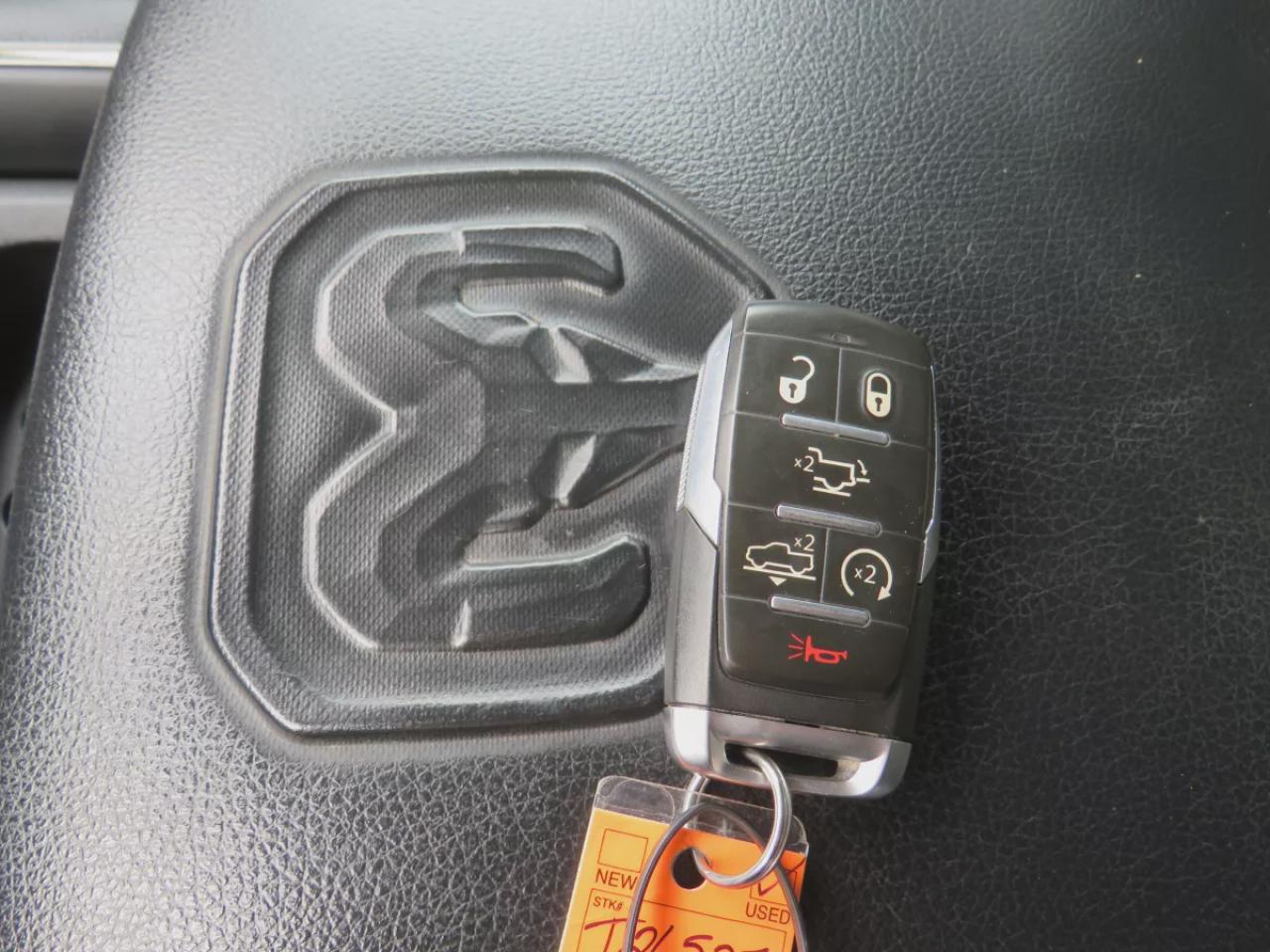 2022 RAM 1500 Rebel (**SAFETY/CERTIFIED!!**4WD**RUNNING BOARDS**TRAILER HITCH**TONNEAU COVER**REMOTE START**BRAKE CONTROLLER**FRONT TOW HOOKS**NAVIGATION**FOG LIGHTS**WIRELESS PHONE CHARGING**HEATED FRONT AND REAR SEATS**REVERSE CAMERA**LEATHER**SUNROOF**PUSH BUTTON ST Photo