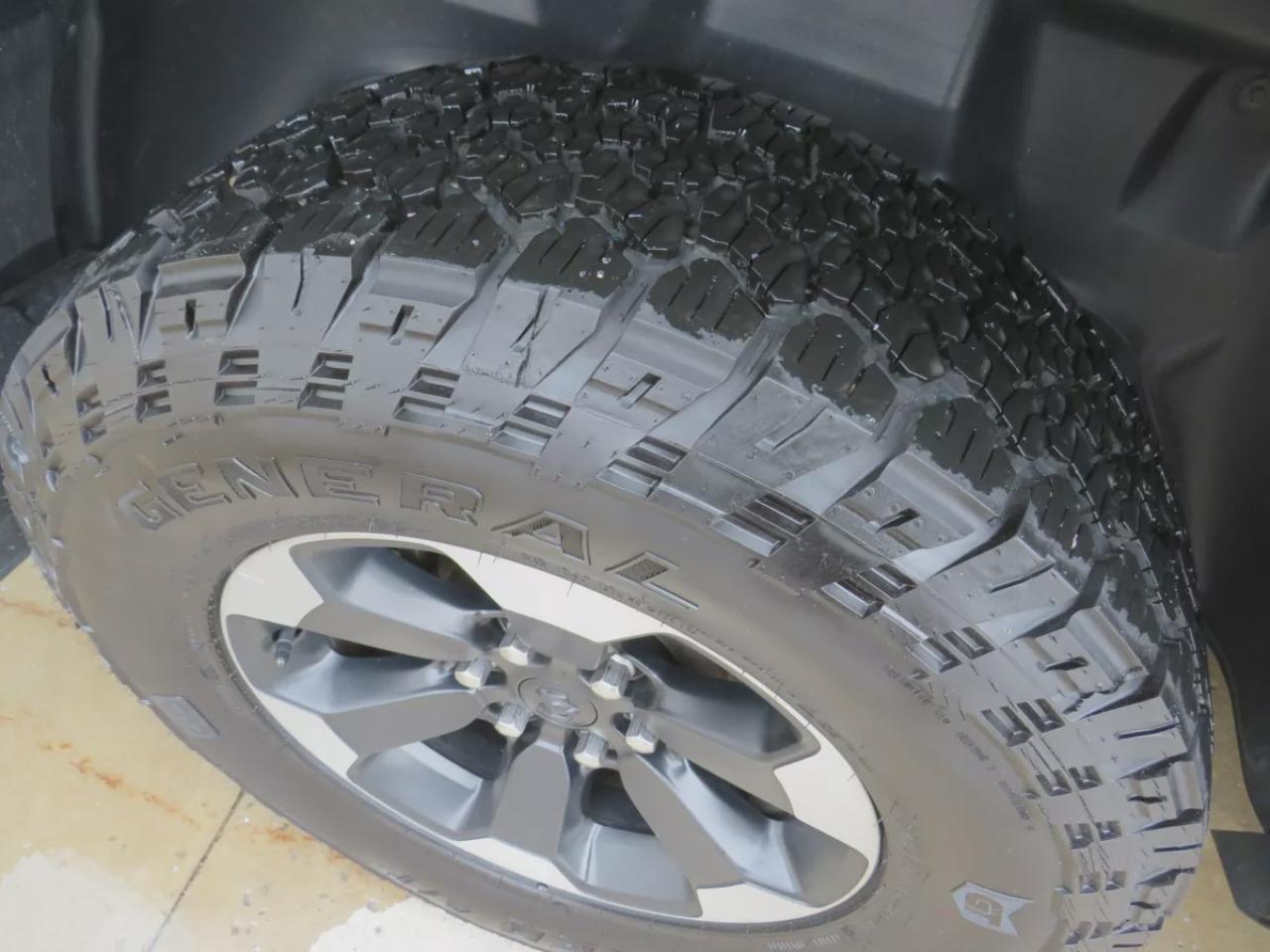 2022 RAM 1500 Rebel (**SAFETY/CERTIFIED!!**4WD**RUNNING BOARDS**TRAILER HITCH**TONNEAU COVER**REMOTE START**BRAKE CONTROLLER**FRONT TOW HOOKS**NAVIGATION**FOG LIGHTS**WIRELESS PHONE CHARGING**HEATED FRONT AND REAR SEATS**REVERSE CAMERA**LEATHER**SUNROOF**PUSH BUTTON ST Photo