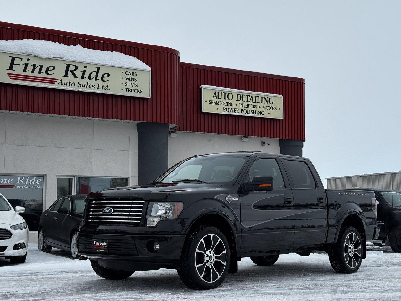 <p>2012 Ford F-150 Harley Davidson Super Crew 4X4</p><p>6.2LTR V8<br>ONLY 181,000kms! (Approximately 13,000kms per year)<br>A/C<br>Power tilt steering<br>Power windows<br>Power locks<br>Power folding mirrors<br>Power pedals<br>Power seats<br>Memory seat (drivers)<br>Heated & air-conditioned front seats<br>Rear heated seats<br>Power rear sliding window<br>5 passengers<br>AM/FM radio<br>SYNC by Microsoft  /  Bluetooth  /  NAV<br>Buckets & console<br>Factory remote starter<br>Locking tail gate<br>Factory 22 aluminum wheels<br>5.5ft box<br>Back up camera with rear parking sensors<br>Fog lights<br>Sunroof<br>Original Manitoba truck!<br>MUST BE SEEN!</p><p>GVW: 7,350LBS<br>Gear ratio: 3.73<br>Transmission: 6 speed, 6R80<br>Towing: Approximately 7,300LBS</p><p>$27,975 Safetied<br>Financing and Warranty Available at Fine Ride Auto Sales Ltd<br>www.FineRideAutoSales.ca</p><p>Call: 204-415-3300 or 1-855-854-3300<br>Text: 204-226-1790<br>View in person at: Unit 3-3000 Main Street</p><p>DLR# 4614<br>**Plus applicable taxes**</p><p></p><p><span style=color:#000000;><span style=font-family:book antiqua, palatino, serif;font-size:14pt;>Monday                9am to 6pm</span></span><br><span style=color:#000000;><span style=font-family:book antiqua, palatino, serif;font-size:14pt;>Tuesday               9am to 6pm</span></span><br><span style=color:#000000;><span style=font-family:book antiqua, palatino, serif;font-size:14pt;>Wednesday               9am to 6pm</span></span><br><span style=color:#000000;><span style=font-family:book antiqua, palatino, serif;font-size:14pt;>Thursday                9am to 6pm</span></span><br><span style=color:#000000;><span style=font-family:book antiqua, palatino, serif;font-size:14pt;>Friday                9am to 5pm</span></span><br><span style=color:#000000;><span style=font-family:book antiqua, palatino, serif;font-size:14pt;>Saturday                             10am to 2pm</span></span><br><span style=color:#000000;><span style=font-family:book antiqua, palatino, serif;font-size:14pt;>Sunday                    CLOSED</span></span></p>