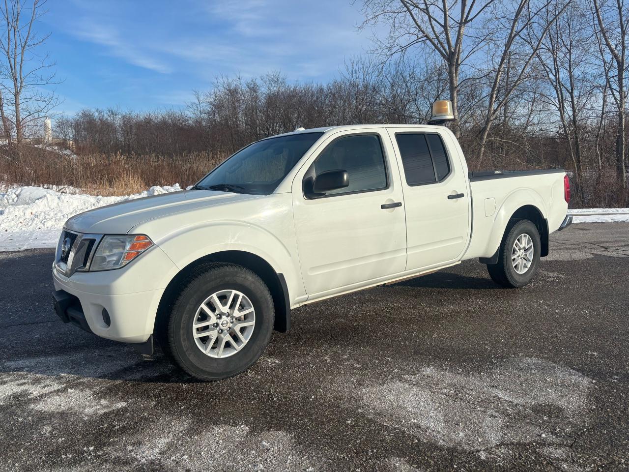 <div>2014 Nissan frontier crew cab Automatic transmission air-conditioning runs and drives perfectly has a few dents here and there no warning lights on the dash. &nbsp;Plus, HST</div>