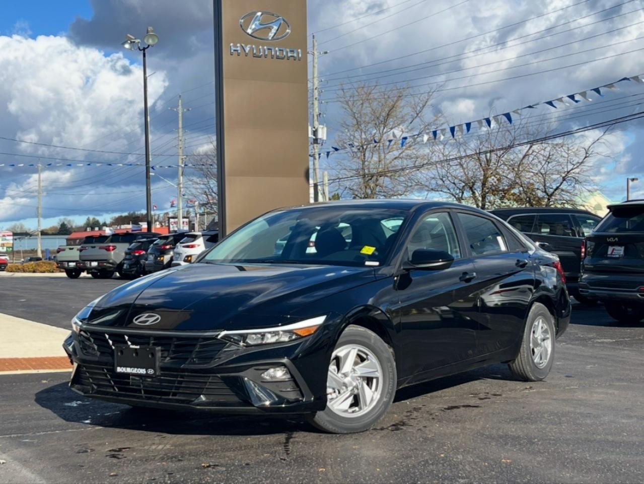 <p>Introducing the stunning 2026 Hyundai Elantra Essential in elegant black with front-wheel drive, engineered for smooth and confident handling. This sedan promises both style and reliability. Its sophisticated exterior is perfectly complemented by equally stylish black interiors, offering a comfortable and inviting cabin environment.</p><p>The Elantra Essential IVT comes complete with a suite of modern features. Enjoy the convenience of air conditioning, cruise control, and power windows, enhancing your driving experience. With alloy wheels adding a touch of flair, the car also boasts heated seats and mirrors for that extra comfort during colder months.</p><p>Technology takes center stage with the Elantra's smart device integration, allowing seamless connectivity on the go. Stay safely connected with the Bluetooth connection, while the backup camera and lane assist provide peace of mind for both city and highway driving.</p><p>Ideal for modern urban dwellers seeking efficiency and style, the 2026 Hyundai Elantra Essential embodies the perfect blend of functionality and aesthetics. Dont miss the opportunity to make this sleek sedan your own. Contact our dealership today to learn more and schedule a test drive. Its time to elevate your everyday driving experience!</p> <p><strong>Advertised Cash Purchase Price</strong> includes a $500 loyalty offer for eligible buyers. See dealer for complete details. Offer ends Jan 2, 2026. </p> <p><strong>Why Choose the Bourgeois Auto Group?</strong></p><p>For 80 years, Bourgeois Auto Group has been delivering exceptional automotive experiences. Our factor trained teams work to ensure you receive the shopping experience you deserve; whether you're looking for a new or new-to-you vehicle.</p><p>Shop 24/7 with our online showroom and chat service, ensuring convenience every step of the way. No hidden fees, full disclosure, and every pre-owned vehicle comes with a Carfax® report for peace of mind.</p><p>We offer a wide selection of pre-owned vehicles, all competitively priced using real-time market data. Get the best deal on your purchase and trade-in with our free Live Market Analysis report.</p><p>Looking to sell your car? We buy any make or modelno purchase required. Our simple to use online trade valuation tool will provide you with a clear, transparent selling experience whether you buy our car or not.</p><p>Backed by hundreds dedicated employees across 4 convenient locations, were here to meet all your automotive needs. Visit us in Midland or Parry Sound and explore our inventory or schedule your next service today.</p> <p><strong>Financing Your Next Vehicle with Bourgeois Midland Hyundai:</strong></p><p>At Bourgeois Midland Hyundai, we make financing your next vehicle simple and stress-free! Our team works with trusted lenders to find flexible options tailored to your budget. Drive away with confidenceapply today!</p><p>Take advantage of our online pre-qualification tool, backed by Equifax and TD Bank to find the payment that works for you. Simply <a href=https://www.bourgeoishyundai.com/pre-qualify-for-financing/ rel=nofollow><strong>CLICK HERE</strong></a> to use our secure online credit tool with no impact to your credit. </p>