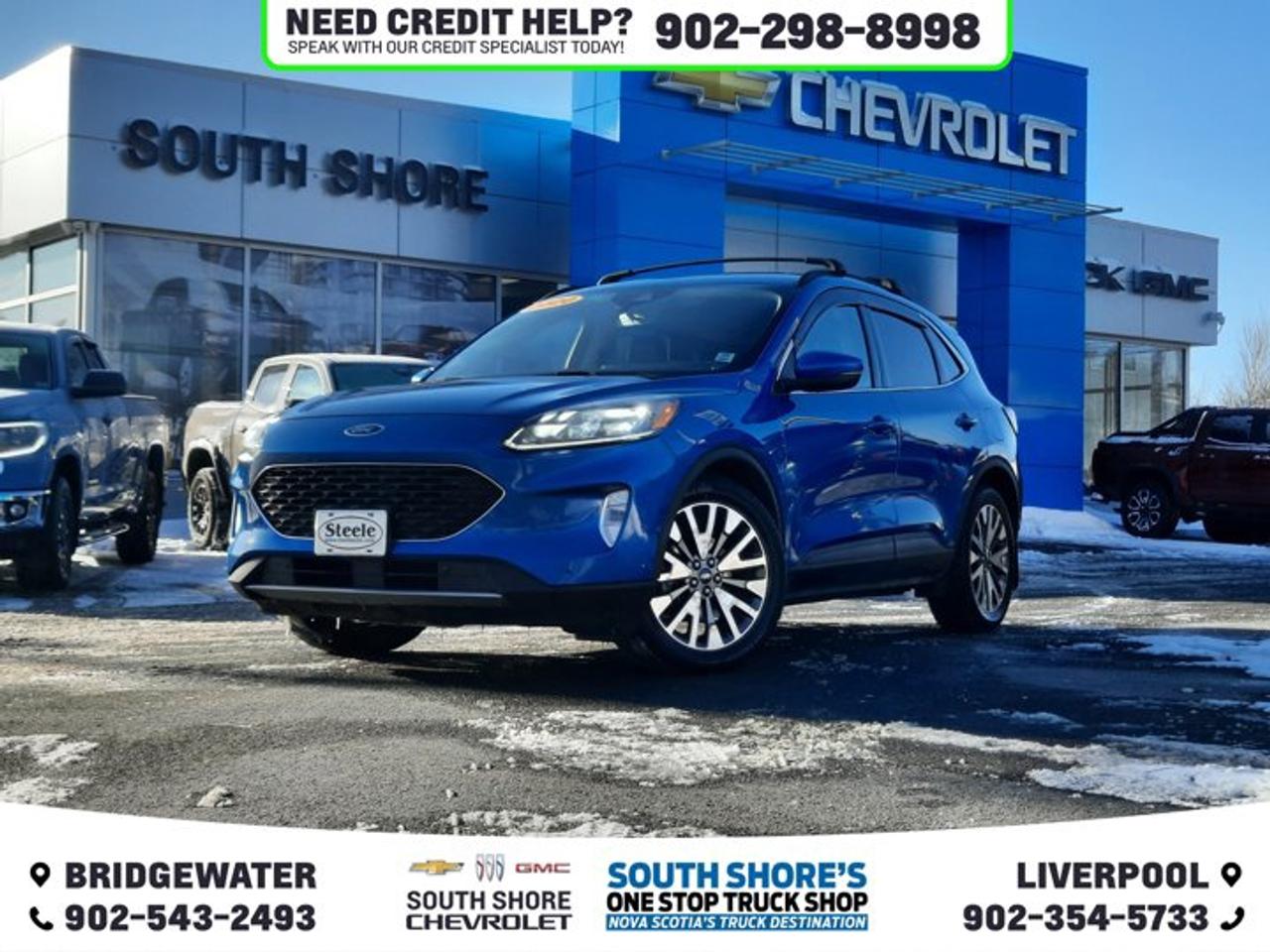 Awards: * JD Power Canada Automotive Performance, Execution and Layout (APEAL) Study Recent Arrival! Blue Metallic 2020 Ford Escape Hybrid Titanium For Sale, Bridgewater FWD eCVT 2.5L iVCT Clean Car Fax, 2.5L iVCT, 10 Speakers, ABS brakes, Air Conditioning, Alloy wheels, Automatic temperature control, Brake assist, Compass, Delay-off headlights, Driver door bin, Electronic Fuel Door Release, Electronic Stability Control, Emergency communication system: SYNC 3 911 Assist, Equipment Group 400A, Four wheel independent suspension, Front anti-roll bar, Front Bucket Seats, Front dual zone A/C, Front fog lights, Fully automatic headlights, Heated door mirrors, Heated front seats, Illuminated entry, Knee airbag, Low tire pressure warning, Navigation System, Outside temperature display, Overhead airbag, Pedestrian Alert Sounder, Power door mirrors, Power driver seat, Power Liftgate, Power passenger seat, Power windows, Radio data system, Rear window defroster, Rear window wiper, Remote keyless entry, Security system, Speed control, Speed-sensing steering, Telescoping steering wheel, Tilt steering wheel, Traction control, Trip computer, Turn signal indicator mirrors, Variably intermittent wipers, Wireless Charging Pad.
