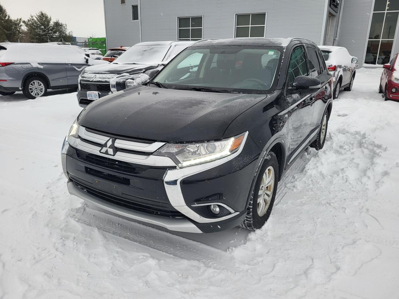 <p>Looking for a reliable and capable SUV thats ready for any adventure? Look no further than this pre-owned 2018 Mitsubishi Outlander SE, now available at Barrie Mitsubishi! This versatile crossover is perfect for families, commuters, and anyone who craves a vehicle that can handle both city streets and weekend getaways. With its proven track record and comfortable interior, this Outlander SE is poised to become your go-to vehicle for years to come. Plus, with only 89,200km on the odometer, this SUV has plenty of life left to offer.</p><p>This Outlander SE is equipped with all-wheel drive, ensuring confident handling in various weather conditions. Its a four-door SUV that runs on gasoline with an automatic transmission. Youll enjoy a smooth and efficient driving experience whether youre navigating urban landscapes or exploring the great outdoors. This Outlander SE provides the perfect blend of practicality, comfort, and performance, all wrapped up in a stylish and dependable package. Visit Barrie Mitsubishi today and experience the difference!</p><p>Here are some of the key features that make this 2018 Mitsubishi Outlander SE stand out:</p><ul><li><strong>Ready for Anything:</strong> Conquer any terrain with the confidence of 4-wheel drive.</li><li><strong>Family-Friendly Design:</strong> The four-door design offers easy access for passengers.</li><li><strong>Fuel-Efficient Performance:</strong> Enjoy a gasoline engine with solid fuel economy, saving you money at the pump.</li><li><strong>Automatic Convenience:</strong> Experience effortless driving with a smooth automatic transmission.</li><li><strong>Low Mileage:</strong> With only 89,200km, this Outlander has plenty of adventures ahead!</li></ul><p><strong><em>Powered by AutoIntelligence&trade;</em></strong> Vehicle information has been generated using artificial intelligence and is provided for informational purposes only. While efforts are made to ensure accuracy, please confirm all details directly with the dealer.</p>