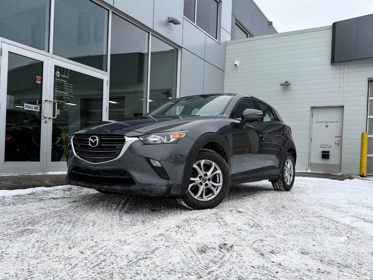 Discover the perfect blend of style, efficiency, and all-weather confidence with this pre-owned 2019 Mazda CX-3 GS Auto AWD in sleek Machine Grey Metallic. Powered by a responsive 2.0L SKYACTIV-G 4-cylinder engine paired with a smooth 6-speed automatic transmission, this compact SUV offers agile handling and impressive fuel economy.Enjoy the comfort of adjustable heated front seats, premium cloth upholstery, and automatic climate control, while staying connected with an infotainment system featuring AM/FM/HD radio and smart device integration. The SUVs all-wheel drive and advanced safety features like blind spot warning and rear collision warning keep you secure on every drive.With 16 silver alloy wheels, a rear camera, and refined Mazda craftsmanship inside and out, the CX-3 GS is ready to elevate your daily commute or weekend adventures. Visit us today to experience its perfect balance of fun and functionality!Vehichle previously registered in QuebecVehichle has a $7300.78 claim on the Carfax history reportGo Mazda is a AMVIC licenced buisness