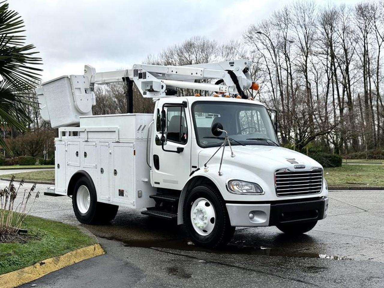 This 2005 Freightliner M2 106 service truck is equipped with an Altec AT37-G aerial bucket, providing a platform height of approximately 37 ft 8 in with a 350 lb platform capacity. Powered by a 6.4L Mercedes-Benz MBE-900 diesel engine paired with an automatic transmission and rear-wheel drive, it is configured for utility, maintenance, and light aerial work. The service body includes multiple locking storage compartments, PTO-driven hydraulics, engine brake, heated mirrors, cruise control, and air-assisted hydraulic brakes. Interior features include air conditioning and heat, AM/FM radio, and a cloth-trimmed cab finished in white exterior with grey interior, offering a practical and purpose-built setup for electrical, signage, or general service applications. This item is currently OFFSITE. You must register an appointment with our office to schedule an offsite viewing. Appointments must be made a minimum of one business day in advance (and as defined by the days that Repo.com is open for business) before your appointment can be scheduled and confirmed. We may, at our own discretion, instead opt to transport smaller items to Repo.coms main yard for viewing purposes.  $48,580.00 plus $375 processing fee, $48,955.00 total payment obligation before taxes.   Listing report, warranty, contract commitment cancellation fee, financing available on approved credit (some limitations and exceptions may apply). All above specifications and information is considered to be accurate but is not guaranteed and no opinion or advice is given as to whether this item should be purchased. We do not allow test drives due to theft, fraud, acts of vandalism and undetectable impaired driving. Instead we provide the following benefits: Complimentary Warranty (with options to extend), Limited Money Back Satisfaction Guarantee on Fully Completed Contracts, Contract Commitment Cancellation, and an Open-Ended Sell-Back Option. Ask seller for details or call 604-522-REPO(7376) to confirm listing availability.