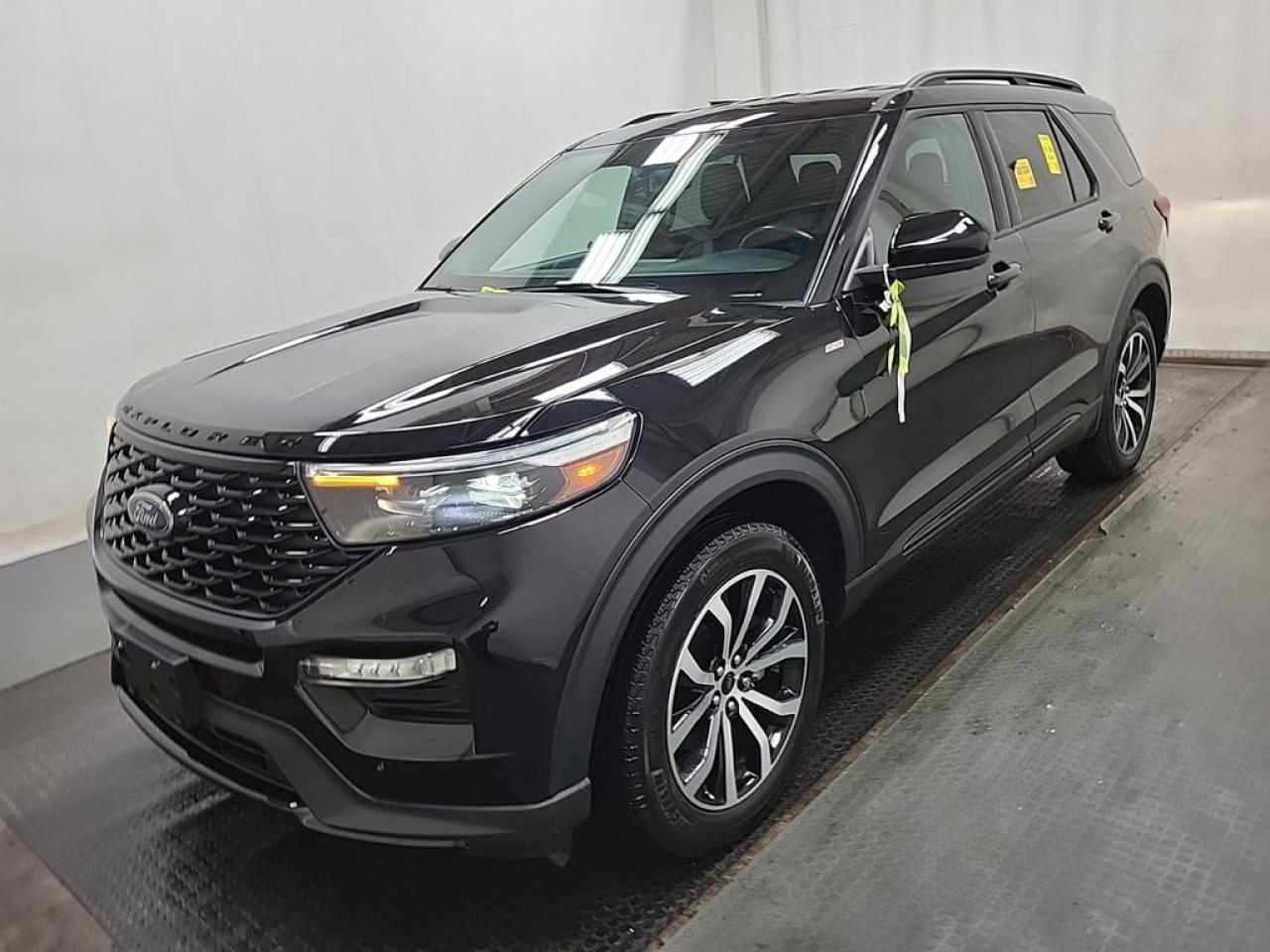 THE PRICE YOU SEE, PLUS GST. GUARANTEED!APPLE CARPLAY/ANDROID AUTO COMPATABLE! 2.3 LITER ECOBOOST, 10 SPEED AUTO, ST-LINE TRIM(250a), EBONY ACTIVE-X SEATS W RED STITCHING, POWER/HEATED FRONT SEATS, LEATHER WRAPPED STEERING WHEEL W/TILT/TELESCOPIC, ROOF SIDE RAILS, FORD PASS CONNECT, B&O AUDIO SYSTEM, AUTO START/STOP REMOVAL.        The 2022 Ford Explorer ST-Line with the 2.3-liter engine, 250A package, and auto start/stop removal is a sporty and well-equipped midsize SUV that combines performance, style, and practicality. The 2.3-liter turbocharged EcoBoost four-cylinder engine delivers spirited acceleration and a good balance of power and efficiency, making it suitable for both urban commuting and highway driving. The ST-Line trim enhances the vehicles sporty aesthetic with unique exterior styling cues, such as distinct grille designs, sporty wheels, and interior accents, giving it a more aggressive and dynamic look without the full performance upgrades of the ST model. The 250A package typically adds comfort, convenience, and technology features, including a larger touchscreen infotainment system with SYNC 3 or 4, smartphone integration, premium audio options, and additional driver-assistance features like blind-spot monitoring and adaptive cruise control. The removal of auto start/stop is a notable modification, often preferred by drivers who want to eliminate the engines automatic shutdown at idle for a smoother, more seamless driving experience and to avoid potential issues with the system. Overall, this Explorer ST-Line offers a compelling blend of sporty styling, modern technology, and reliable performance, tailored for drivers seeking an engaging yet practical family SUV with personalized features.Do you want to know more about this vehicle, CALL, CLICK OR COME ON IN!*AMVIC Licensed Dealer; CarFax and Full Mechanical Inspection Included.