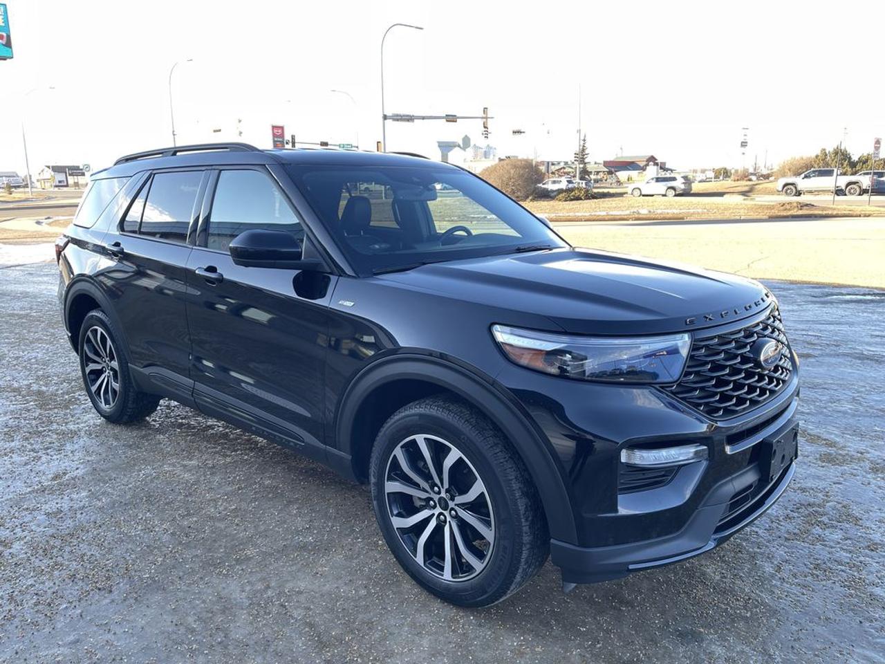 THE PRICE YOU SEE, PLUS GST. GUARANTEED!APPLE CARPLAY/ANDROID AUTO COMPATABLE! 2.3 LITER ECOBOOST, 10 SPEED AUTO, ST-LINE TRIM(250a), EBONY ACTIVE-X SEATS W RED STITCHING, POWER/HEATED FRONT SEATS, LEATHER WRAPPED STEERING WHEEL W/TILT/TELESCOPIC, ROOF SIDE RAILS, FORD PASS CONNECT, B&O AUDIO SYSTEM, AUTO START/STOP REMOVAL.        The 2022 Ford Explorer ST-Line with the 2.3-liter engine, 250A package, and auto start/stop removal is a sporty and well-equipped midsize SUV that combines performance, style, and practicality. The 2.3-liter turbocharged EcoBoost four-cylinder engine delivers spirited acceleration and a good balance of power and efficiency, making it suitable for both urban commuting and highway driving. The ST-Line trim enhances the vehicles sporty aesthetic with unique exterior styling cues, such as distinct grille designs, sporty wheels, and interior accents, giving it a more aggressive and dynamic look without the full performance upgrades of the ST model. The 250A package typically adds comfort, convenience, and technology features, including a larger touchscreen infotainment system with SYNC 3 or 4, smartphone integration, premium audio options, and additional driver-assistance features like blind-spot monitoring and adaptive cruise control. The removal of auto start/stop is a notable modification, often preferred by drivers who want to eliminate the engines automatic shutdown at idle for a smoother, more seamless driving experience and to avoid potential issues with the system. Overall, this Explorer ST-Line offers a compelling blend of sporty styling, modern technology, and reliable performance, tailored for drivers seeking an engaging yet practical family SUV with personalized features.Do you want to know more about this vehicle, CALL, CLICK OR COME ON IN!*AMVIC Licensed Dealer; CarFax and Full Mechanical Inspection Included.