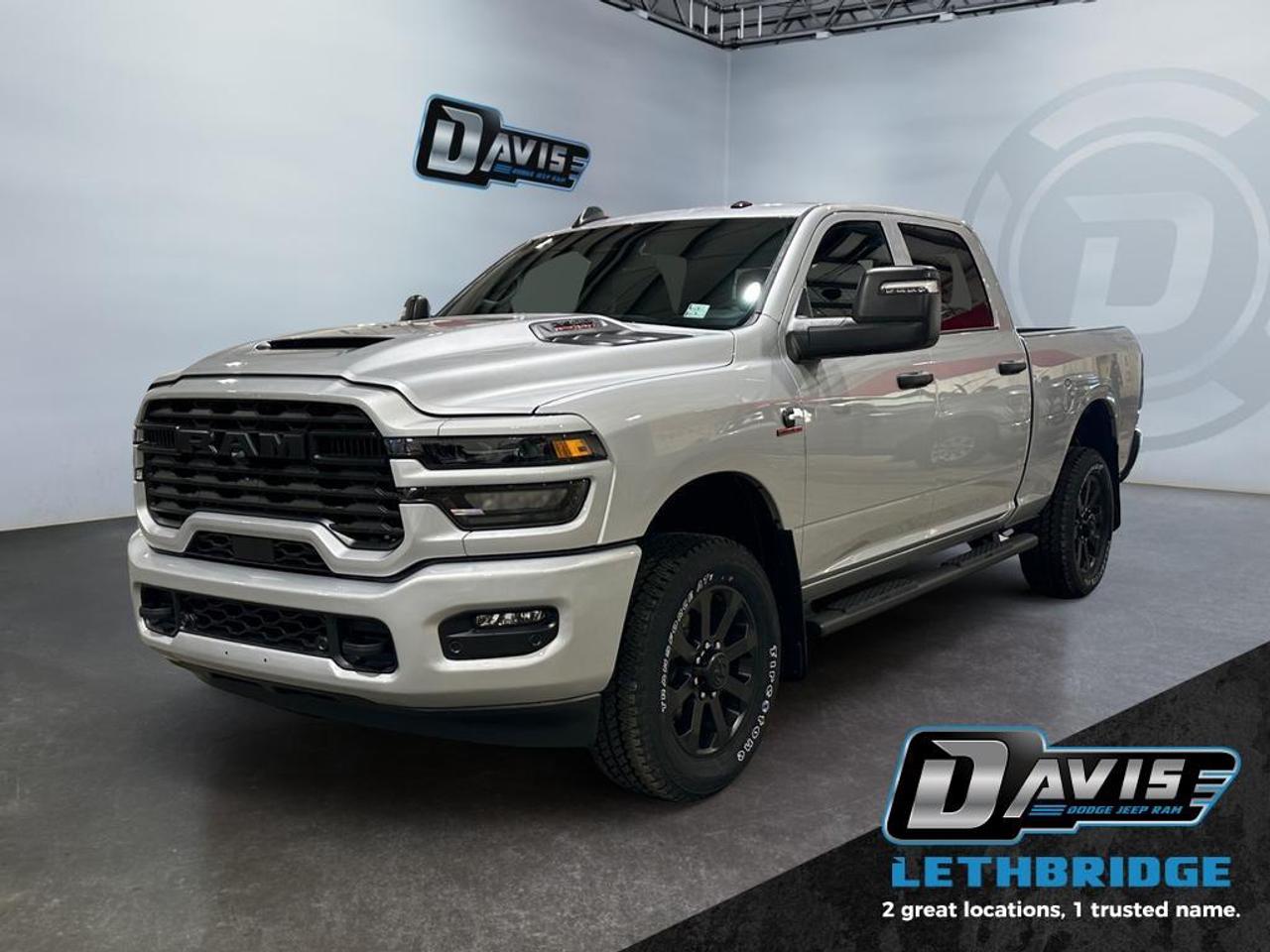<b>Adaptive Cruise Control, Powered Driver Seat, 400W Inverter, Collision Mitigation!<br /> <br /></b><br /> <br /> <br />2026 Ram 2500 Black Express 4x4  The 2026 Ram 2500 Black Express is built for heavy-duty performance with exceptional towing and hauling capabilities. Powered by the 6.7L Cummins I6 Turbo Diesel engine paired with an 8-speed TorqueFlite automatic transmission and 4x4 drivetrain, this truck is ready for the toughest jobs. With features like a Class V receiver hitch, trailer brake control, 5th-wheel/gooseneck prep, and electronic trailer sway damping, its engineered for maximum capability. The Black Express trim with matte black grille, black badging, and 20-inch black painted aluminum wheels gives it a commanding, aggressive look.<br /><br />Inside, the Black Express balances rugged functionality with modern convenience. A 12-inch Uconnect 5 touchscreen display with Apple CarPlay, Android Auto, Alexa Built-In, SiriusXM, and 4G LTE Wi-Fi hotspot keeps you connected, while dual-zone automatic climate control, power-adjustable driver seat, and heavy-duty interior materials make workdays and road trips more comfortable. Advanced safety technologies like adaptive cruise control with stop/go, park assist, pedestrian/cyclist emergency braking, and full-speed forward collision warning provide peace of mind on every drive.<br /><br />This Ram 2500 Black Express also delivers smart utility with LED bed lighting, Mopar spray-in bedliner, capless fuel fill, 400W inverter, and dual auxiliary power outlets. Whether youre towing a trailer, hauling equipment, or navigating off-road terrain, the 2026 Ram 2500 Black Express combines powerful diesel performance, bold styling, and advanced tech in a heavy-duty truck designed to handle any challenge.<br /> <br />To apply right now for financing use this link: <a href=https://lethbridge.davisdodge.ca/free-credit-check/ target=_blank rel=nofollow noopener noreferrer>https://lethbridge.davisdodge.ca/free-credit-check/</a><br /><br /> <br /><br />As a premier Chrysler, Dodge, Jeep and RAM dealership, Davis Dodge proudly offers an extensive selection of new and used vehicles to meet every drivers needs. Customers across Lethbridge, Fort Macleod, Taber, Claresholm, Coaldale, and beyond trust us for daily vehicle specials, certified service and parts, and a seamless online inventory experience. <br /><br /> With competitive financing options and expert support, we make car buying easy and enjoyable. <br /><br /> Ready to hit the road? Schedule your test drive today at Davis Dodge, your trusted Chrysler, Dodge, Jeep and RAM dealer in Lethbridge, Alberta.<br /><br /> Vehicle pricing offer shown expires 2026-04-30. <br /> Come by and check out our fleet of 70+ used cars and trucks and 110+ new cars and trucks for sale in Lethbridge. o~o