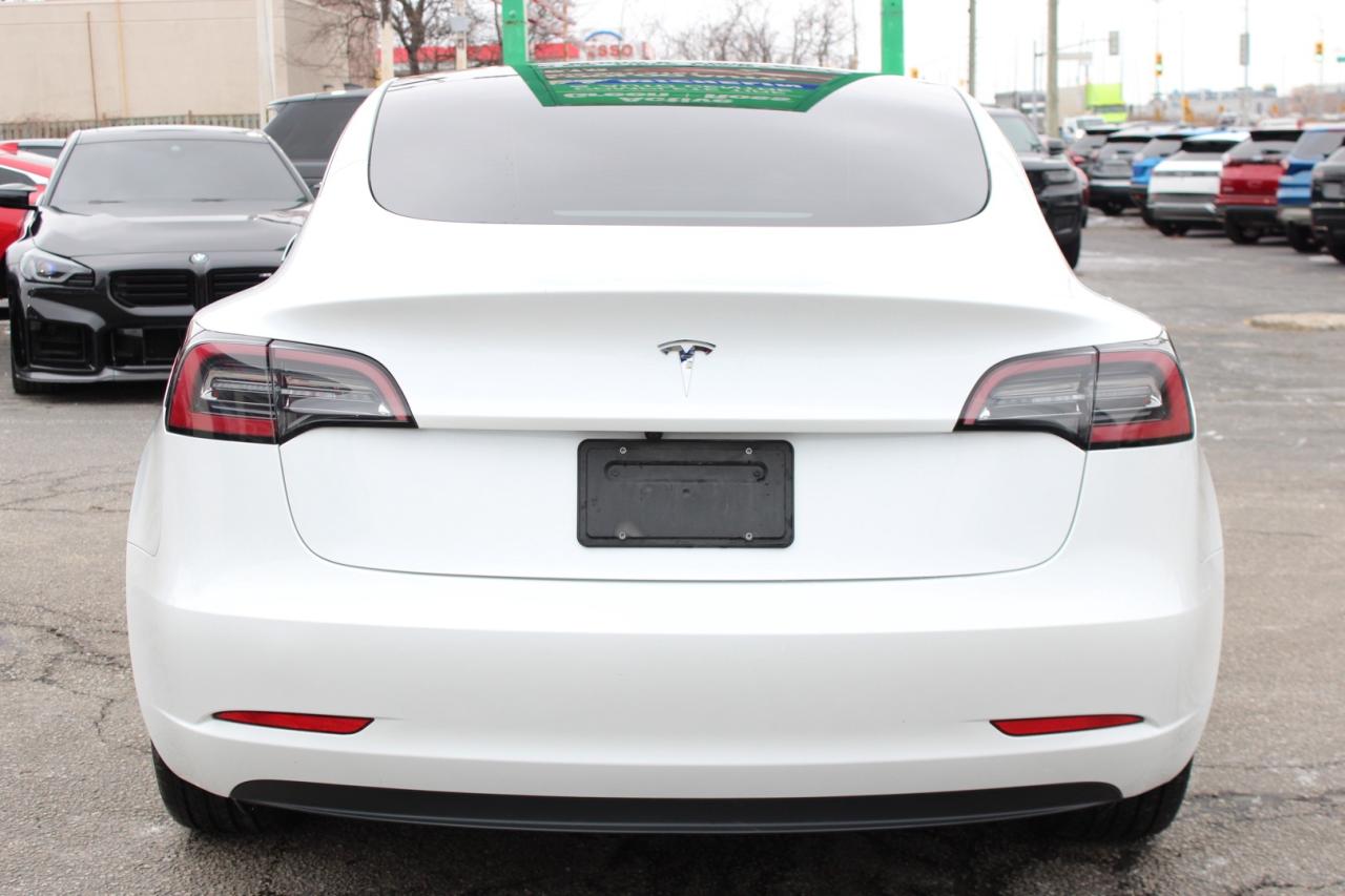 2023 Tesla Model 3 Standard Range Plus White Interior Photo