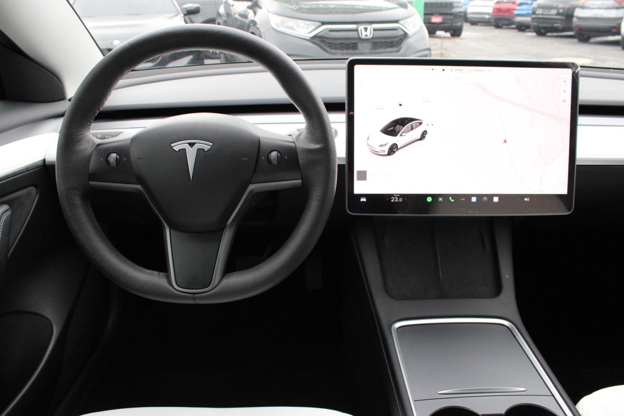 2023 Tesla Model 3 Standard Range Plus White Interior Photo