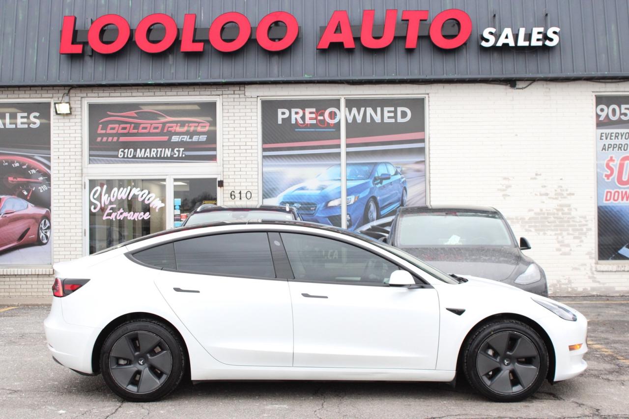 2023 Tesla Model 3 Standard Range Plus White Interior Photo