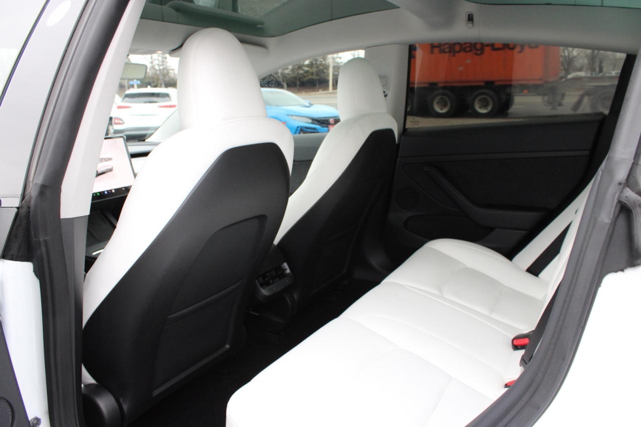 2023 Tesla Model 3 Standard Range Plus White Interior Photo