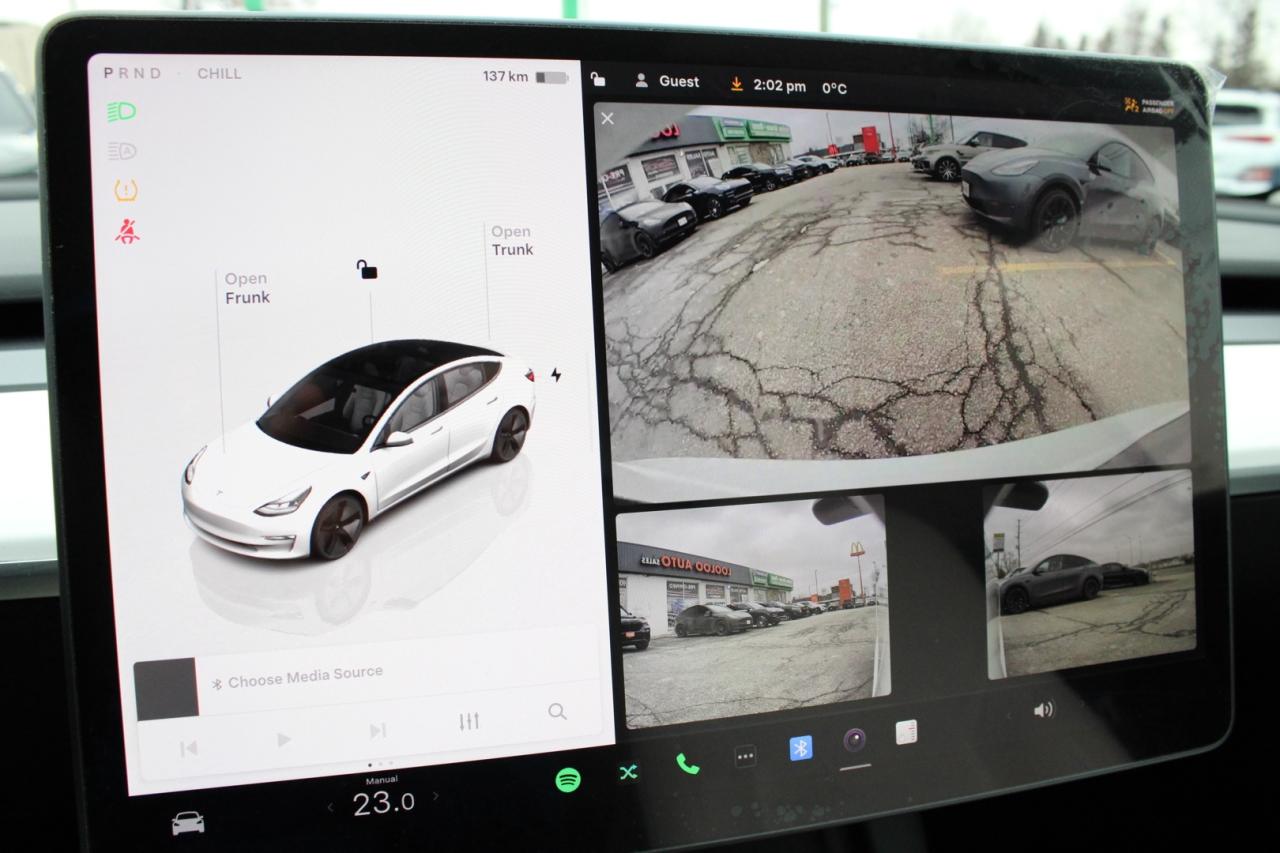 2023 Tesla Model 3 Standard Range Plus White Interior Photo