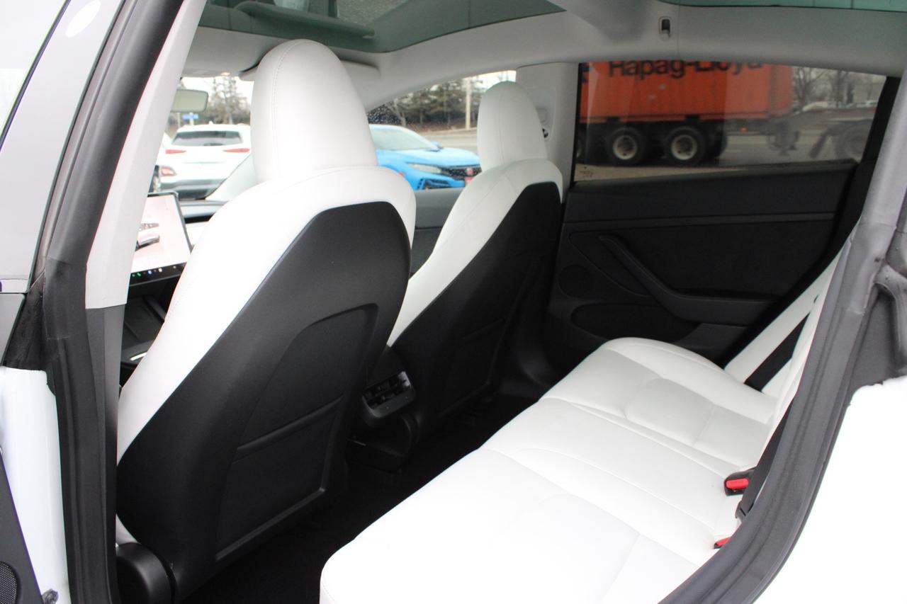 2023 Tesla Model 3 Standard Range Plus White Interior Photo