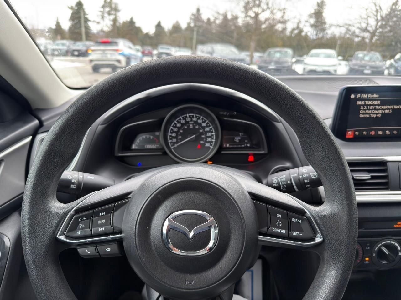 2017 Mazda MAZDA3 GXCERTIFIED AS-TRADED, ACCIDENT-FREE, FWD, MANUAL, Photo