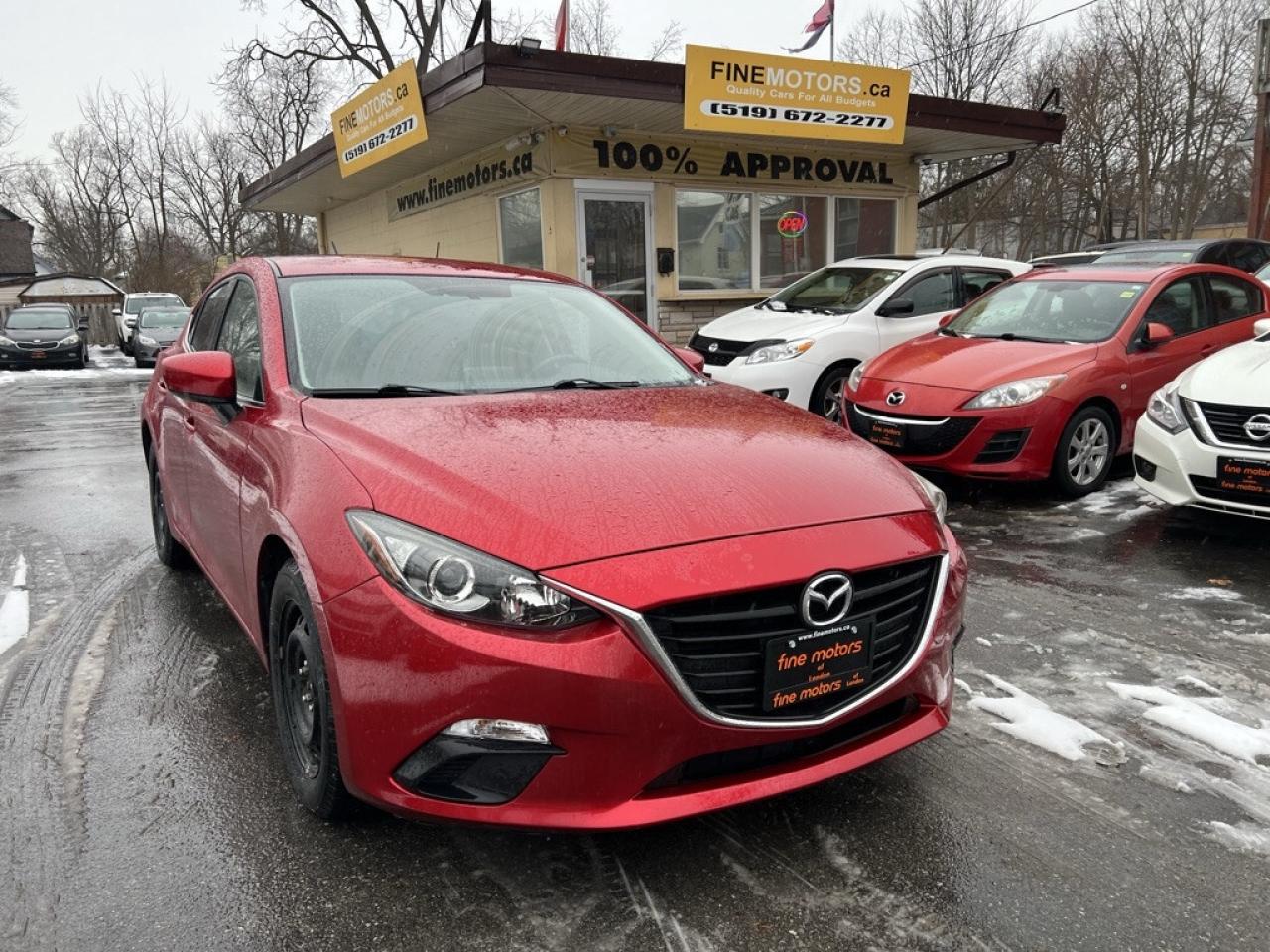 2014 Mazda MAZDA3 4dr Sedan Manual GS-SKY Photo0