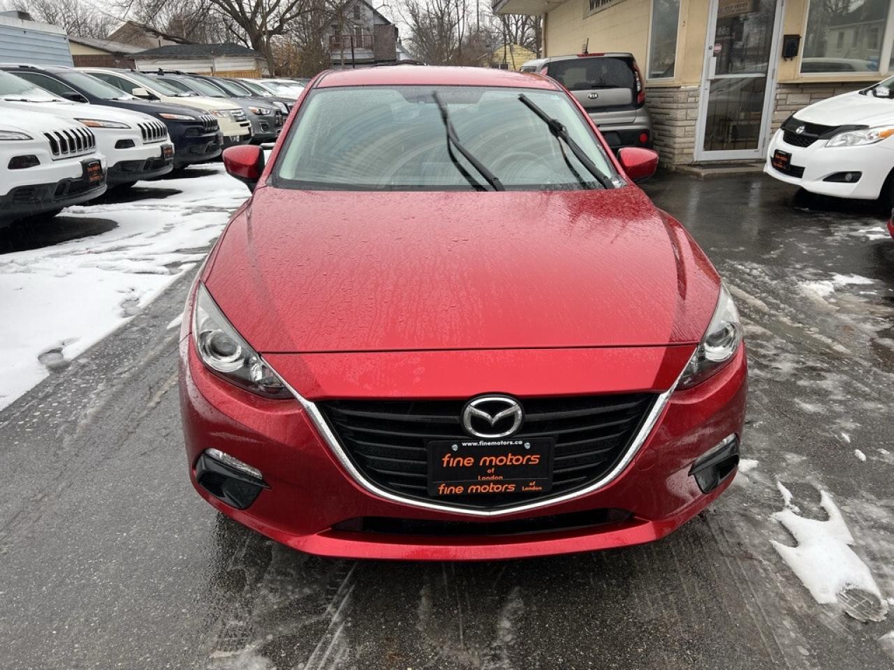 2014 Mazda MAZDA3 4dr Sedan Manual GS-SKY Photo
