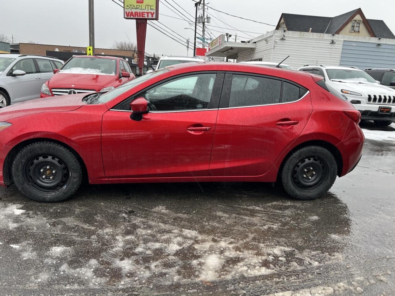 2014 Mazda MAZDA3 4dr Sedan Manual GS-SKY Photo