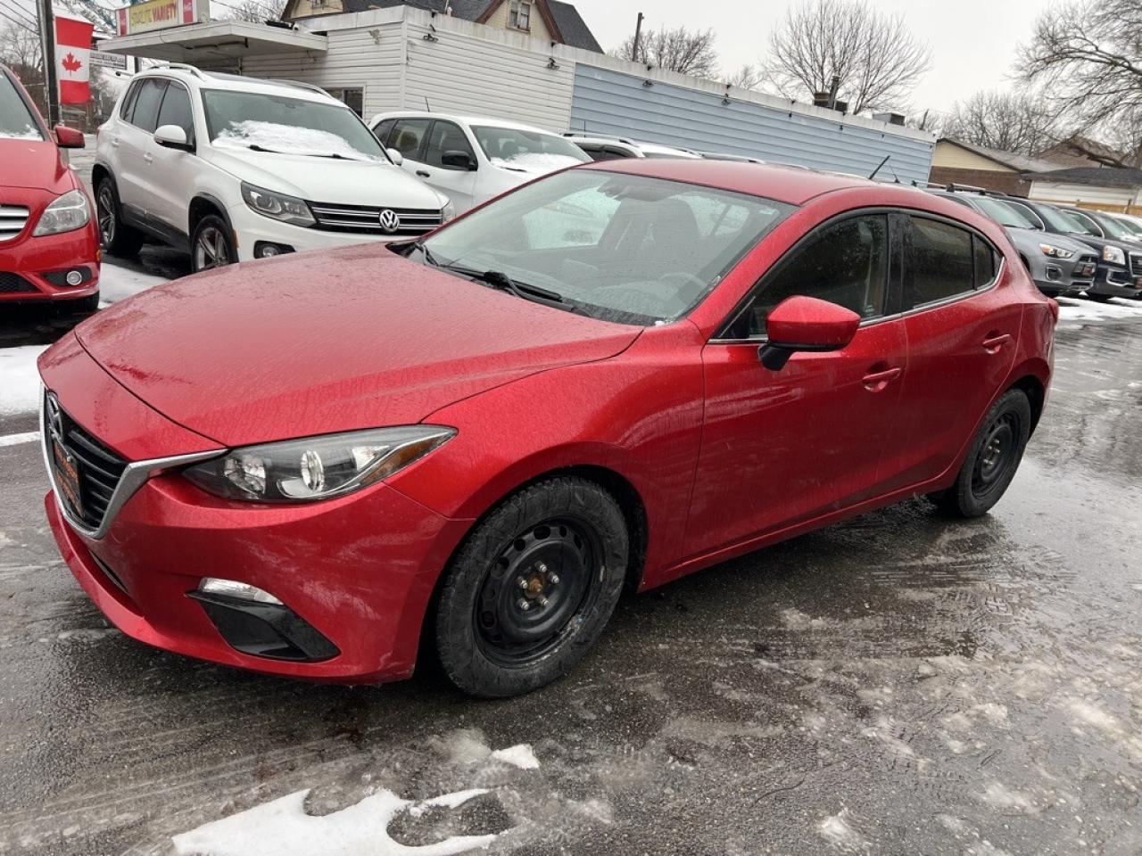 2014 Mazda MAZDA3 4dr Sedan Manual GS-SKY Photo2