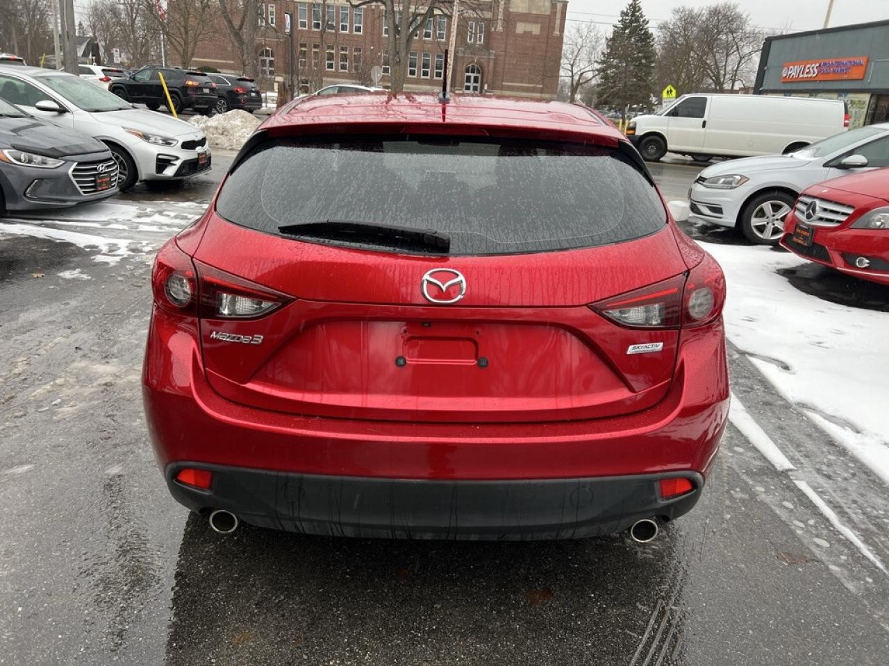 2014 Mazda MAZDA3 4dr Sedan Manual GS-SKY Photo