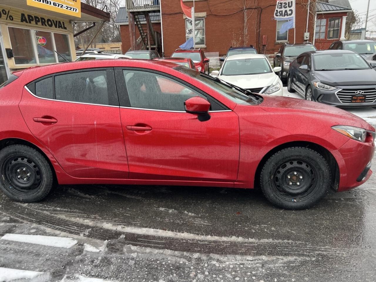 2014 Mazda MAZDA3 4dr Sedan Manual GS-SKY Photo