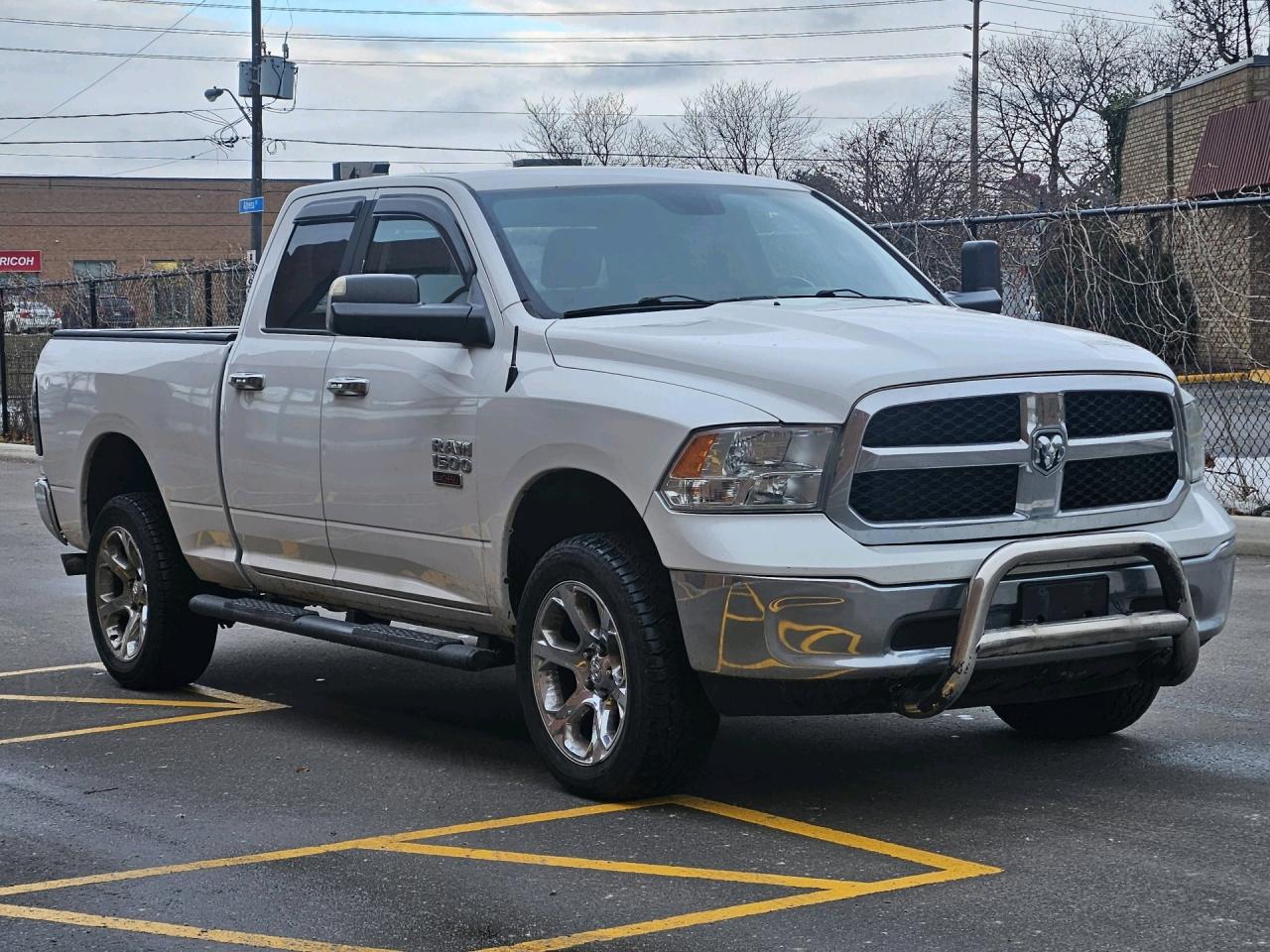 2016 RAM 1500 4WD Quad Cab 140.5 SLT, Diesel, Camera, Chrome Photo0
