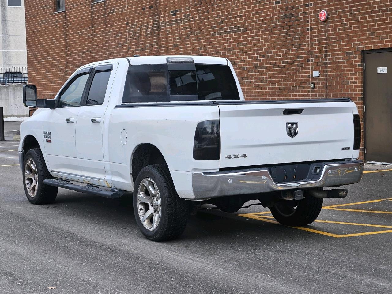 2016 RAM 1500 4WD Quad Cab 140.5 SLT, Diesel, Camera, Chrome Photo