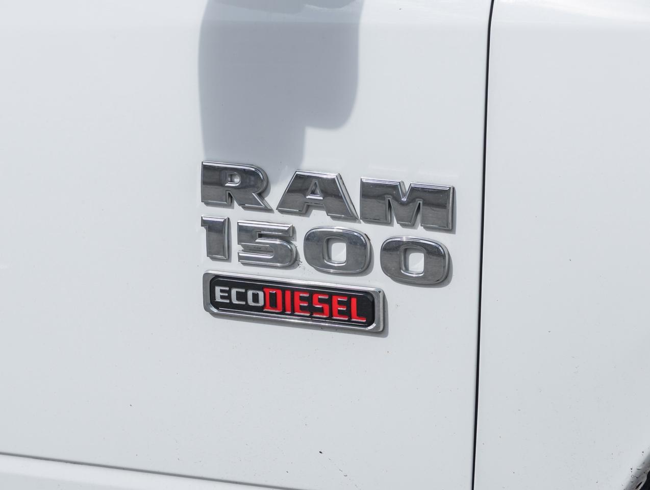 2016 RAM 1500 4WD Quad Cab 140.5 SLT, Diesel, Camera, Chrome Photo