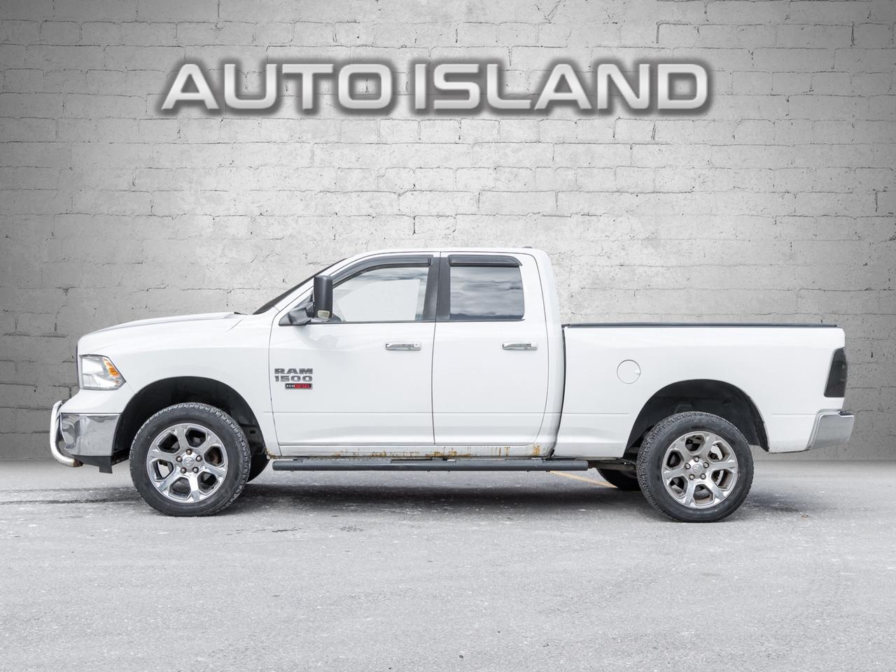 2016 RAM 1500 4WD Quad Cab 140.5 SLT, Diesel, Camera, Chrome Photo