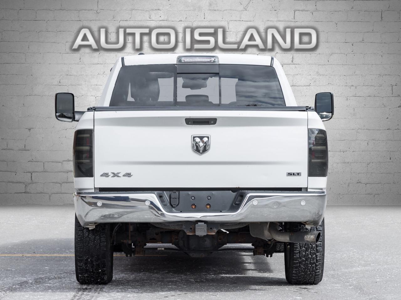 2016 RAM 1500 4WD Quad Cab 140.5 SLT, Diesel, Camera, Chrome Photo