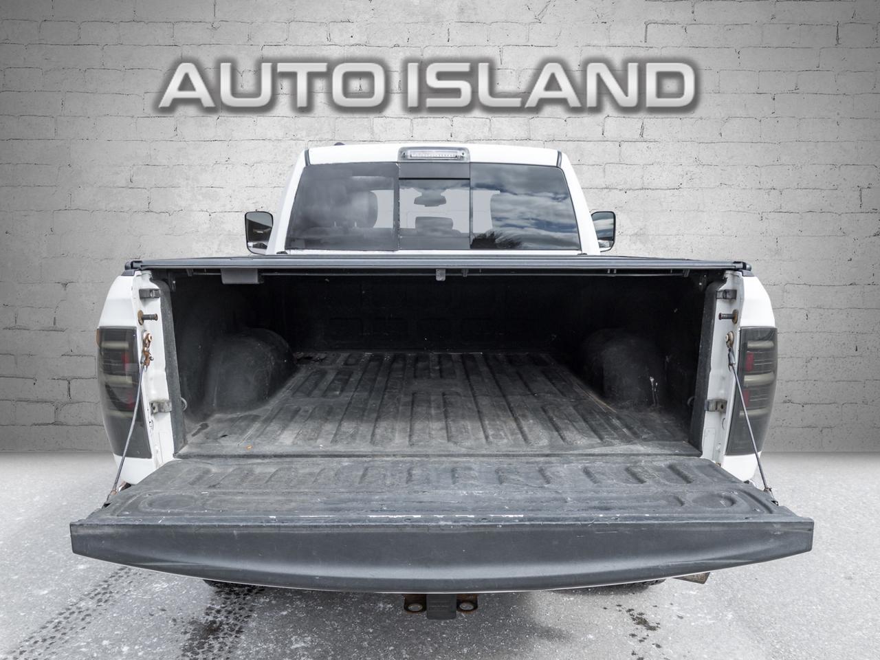 2016 RAM 1500 4WD Quad Cab 140.5 SLT, Diesel, Camera, Chrome Photo