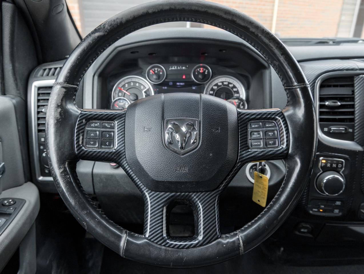 2016 RAM 1500 4WD Quad Cab 140.5 SLT, Diesel, Camera, Chrome Photo