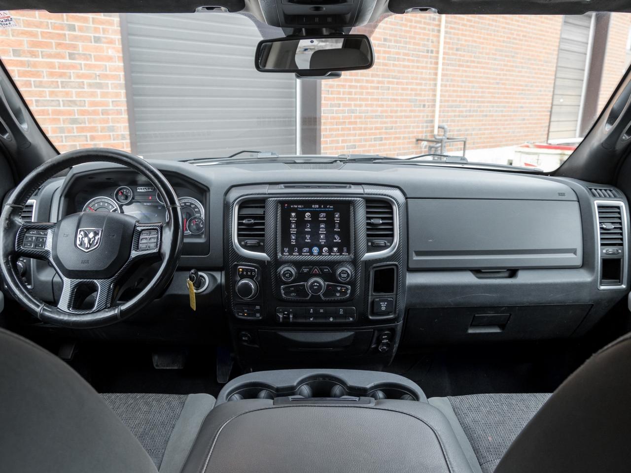 2016 RAM 1500 4WD Quad Cab 140.5 SLT, Diesel, Camera, Chrome Photo