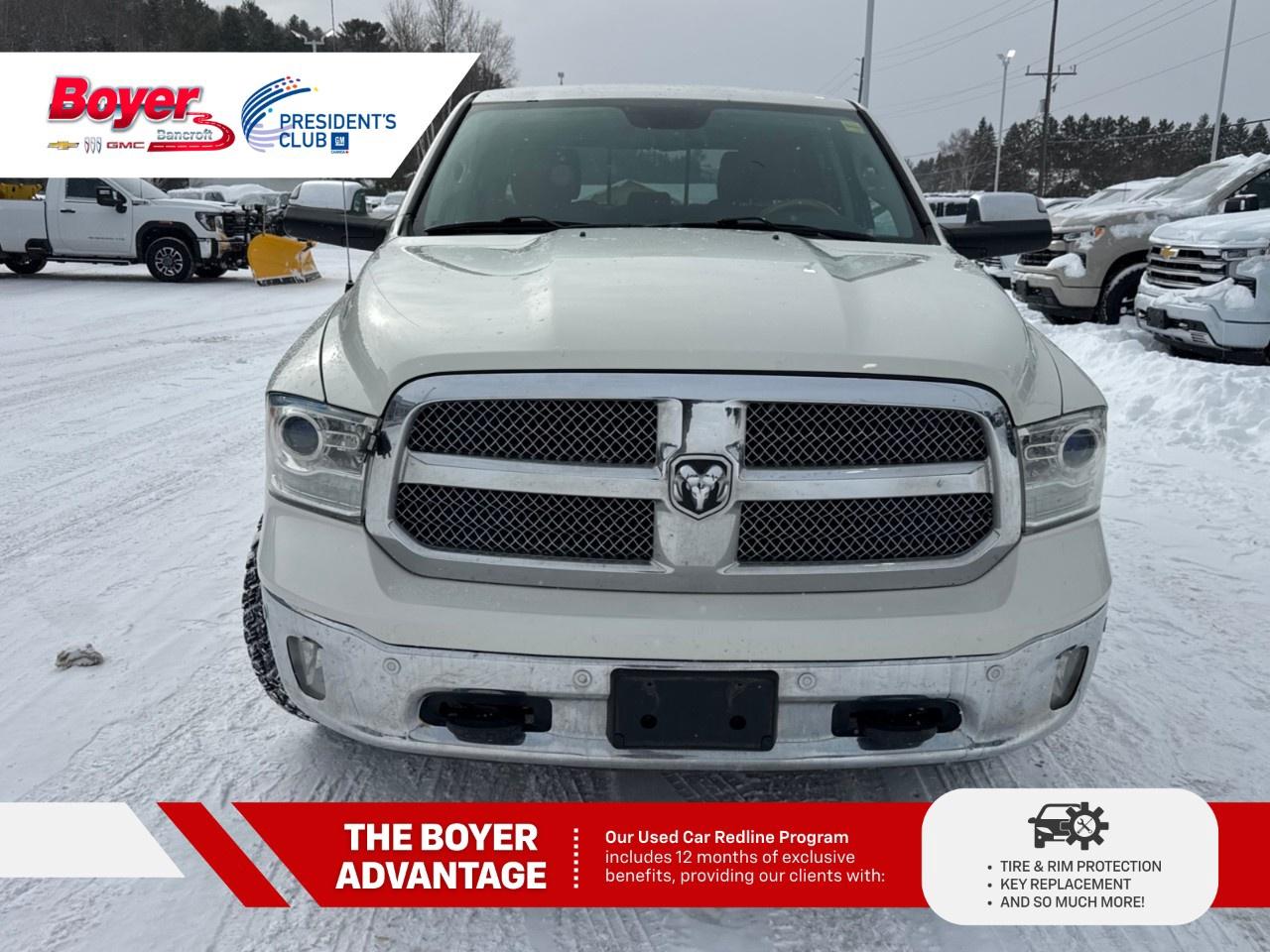2016 RAM 1500 4WD Crew Cab 5.7 Ft Box Longhorn Photo2