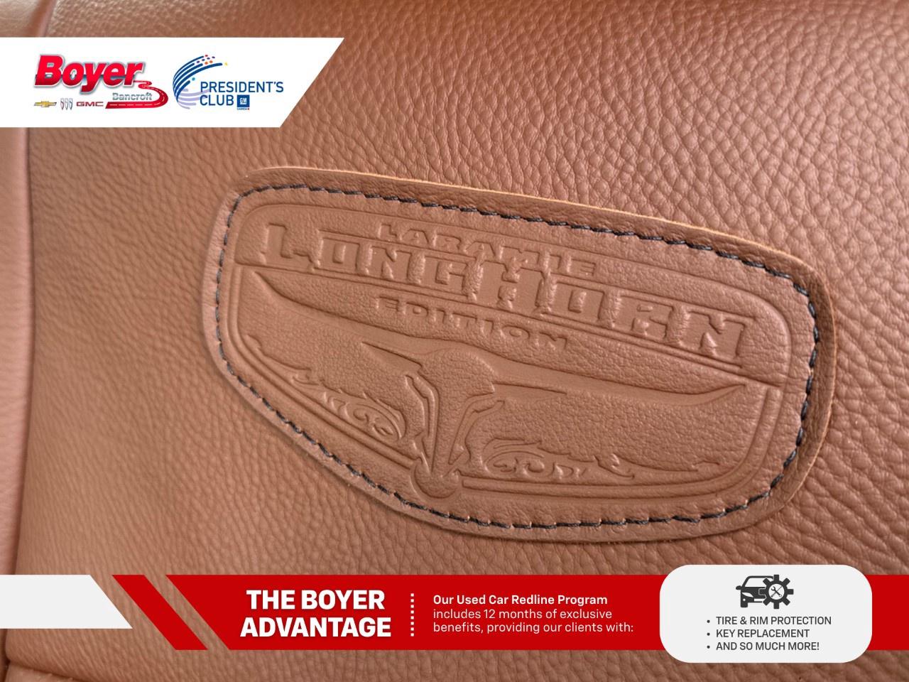 2016 RAM 1500 4WD Crew Cab 5.7 Ft Box Longhorn Photo