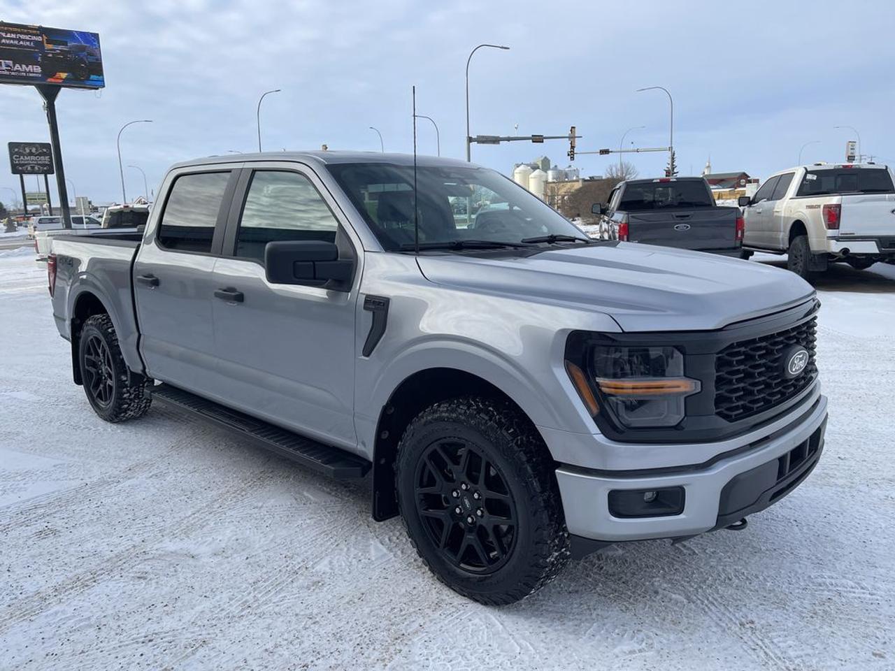 THE PRICE YOU SEE, PLUS GST. GUARANTEED!APPLE CARPLAY/ANDROID AUTO COMPATABLE! ***WARRANTY COVERAGE AVAILABLE WITH THIS TRUCK*** (see dealer for details) 2.7 LITER ECOBOOST, 10 SPEED AUTO, STX TRIM(200a), BLACK CLOTH SEATING, STX BLACK APPEARANCE PKG, 20 GLOSS BLACK ALUMINUM WHEELS, TRAILER BRAKE CONTROL, BLIS W/CROSS TRAFFIC ALERT, REAR VIEW CAMERA, LED FOG LAMPS, ENGINE BLOCK HEATER, FORD PASS CONNECT, LED HEADLAMPS, SYNC 4 INFOTAINMENT W 12 DISPLAY, 136 LITER FUEL TANK.      The 2024 Ford F-150 STX with the 200A package, the STX Appearance Package, and the 2.7-liter EcoBoost V6 engine offers a compelling combination of performance, style, and practicality. The 2.7-liter twin-turbocharged EcoBoost engine delivers a powerful balance of torque and fuel efficiency, making it well-suited for towing, hauling, and everyday driving. The STX trim emphasizes a rugged, no-nonsense aesthetic with functional features, including a bold grille, black exterior accents, and durable interior materials designed for work and outdoor activities. The 200A package adds modern convenience and technology, including a sizable touchscreen infotainment system with Apple CarPlay and Android Auto, a backup camera, and essential driver-assistance features such as lane-keeping assist and adaptive cruise control. The STX Appearance Package enhances the trucks visual appeal with sporty touches like unique wheel designs, body-color accents, and upgraded interior trim, giving it a more aggressive and stylish look. Overall, this configuration of the 2024 Ford F-150 STX is ideal for those seeking a capable, stylish, and well-equipped pickup truck that can handle a variety of tasks while maintaining a rugged and modern appearance.Do you want to know more about this vehicle, CALL, CLICK OR COME ON IN!*AMVIC Licensed Dealer; CarFax and Full Mechanical Inspection Included.