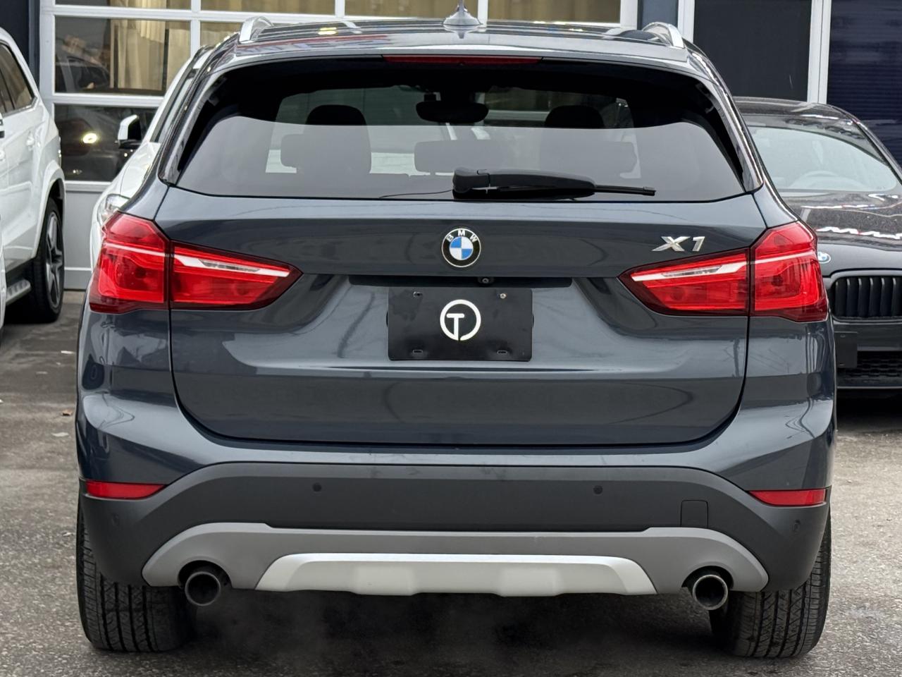 2017 BMW X1 | PREMIUM | PANO | NAVI | HUD | BACK UP CAMERA Photo