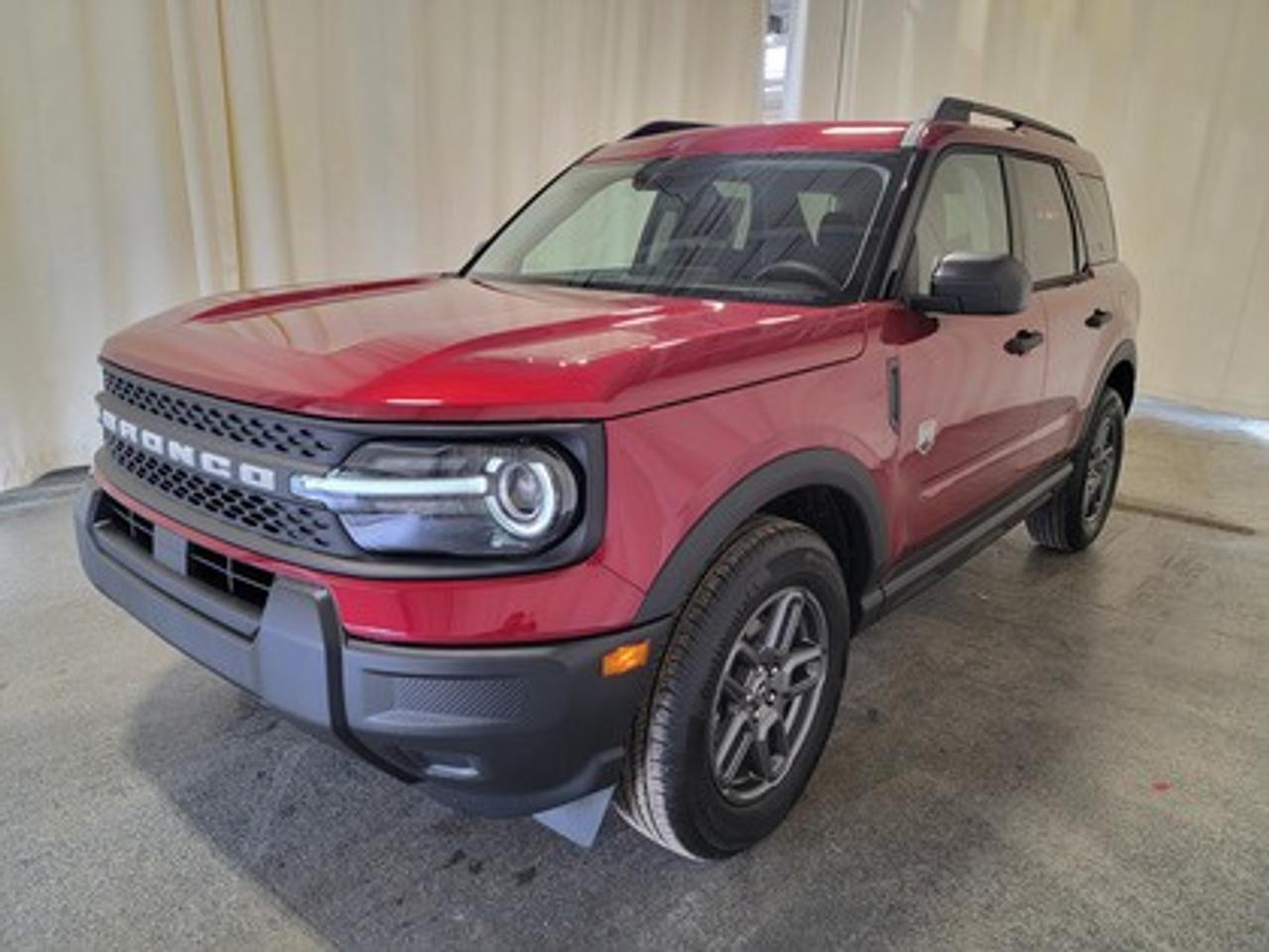 This rugged and refined 2026 Ford Bronco Sport Big Bend 200A stands out in Ruby Red Metallic TC. Built to tackle adventure and city streets alike, this 5-passenger SUV is powered by a 1.5L EcoBoost® engine, delivering 181 horsepower and 190 lb-ft of torque. Coupled with an 8-speed automatic transmission, the Bronco Sport offers impressive fuel efficiency and performance to match your lifestyle.

This vehicle comes with the All-Weather Packageready to take on any season!
Snow, rain, mud, or sunshinethis vehicle is built for it all! The All-Weather Package adds extra protection where it matters most, with premium mud flaps to shield your paint from road debris, all-weather floor mats to protect your interior from lifes messes, and Xpel paint protection to help guard against those infuriating rock chips. Drive with confidence, knowing your investment is protected from Regina's elements.

Key Features Include:
Heated Front Seats
13.2 Center Display
8-Way Power Drivers Seat
SYNC® 4 with a 13.2 Color Touchscreen
Ford Co-Pilot360 Assist+ featuring Adaptive Cruise Control with Stop & Go
Terrain Management System with 5 G.O.A.T. Modes
LED Headlamps, Fog Lamps, and Signature Lighting
17 Carbonized Grey-Painted High Gloss Aluminum Wheels
Wireless Apple CarPlay® and Android Auto Compatibility
Privacy Glass
Intelligent Access with Push-Button Start

Saskatchewans weather is no match for the Bronco Sport Big Bend, thanks to its thoughtful design and advanced technology. The vehicle offers enhanced safety features such as BLIS® (Blind Spot Information System) with Cross-Traffic Alert, Hill Start Assist, and a Rearview Camera with Backup Assist Grid Lines. Inside, comfort is prioritized with electronic automatic temperature control, a premium sound system, heated front seats, and additional storage solutions.

Bennett Dunlop Ford, proudly serving Regina for over 40 years, is conveniently located at 770 Broad Street. With over 3,500 Google reviews, our reputation reflects our commitment to providing a fast, easy, and enjoyable vehicle-buying experience. We eliminate the hassle with no admin or documentation fees, transparent upfront pricing that lets you shop with total confidence. But were more than just a dealershipwere driven to make a difference by supporting local community initiatives and events that matter to you. Visit Bennett Dunlop Ford today and experience why were Reginas trusted choice for quality vehicles, exceptional service, and a genuine commitment to driving change in our community!