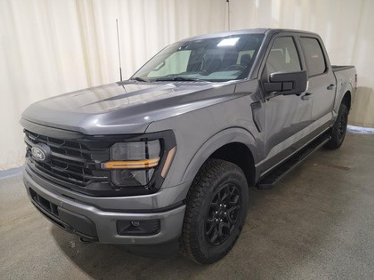 The all-new 2026 Ford F-150 XLT 302A is a statement of style in Carbonized Grey Metallic. Powered by the 2.7L Ecoboost engine, it delivers 395 horsepower and 400 lb-ft of torque, paired with a 10-speed automatic transmission. This truck achieves an impressive, combined fuel economy of 11.8 L/100 km (24 miles per gallon).

This vehicle comes with the All-Weather Packageready to take on any season!
Snow, rain, mud, or sunshinethis vehicle is built for it all! The All-Weather Package adds extra protection where it matters most, with premium mud flaps to shield your paint from road debris, all-weather floor mats to protect your interior from lifes messes, and Xpel paint protection to help guard against those infuriating rock chips. Drive with confidence, knowing your investment is protected from Regina's elements.

Key Features:
12 LCD Captivity Touchscreen
Electronic Power-Assist Steering
Dual-Zone Electronic Auto Temp Control
Cruise Control
Power Windows
AdvanceTrac® With Roll Stability Control
Perimeter Alarm
Ford Co-Pilot360
Lane Keeping System
Rear View Camera
Rear Parking Sensors
Reverse Park Assist
Class IV Trailer Hitch
Power Drivers Seat
Remote Start
SYNC®4
Apple Car Play
18 All Terrain Tires
Bluetooth Connectivity
XLT Black Appearance Package
Engine Block Heater
Trailer Brake Controller

Bennett Dunlop Ford, proudly serving Regina for over 40 years, is conveniently located at 770 Broad Street. With over 3,500 Google reviews, our reputation reflects our commitment to providing a fast, easy, and enjoyable vehicle-buying experience. We eliminate the hassle with no admin or documentation fees, transparent upfront pricing that lets you shop with total confidence. But were more than just a dealershipwere driven to make a difference by supporting local community initiatives and events that matter to you. Visit Bennett Dunlop Ford today and experience why were Reginas trusted choice for quality vehicles, exceptional service, and a genuine commitment to driving change in our community!