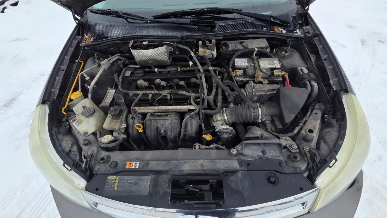 2009 Ford Focus SE, SEDAN, 4 CYL, TRADE IN, DRIVES, AS IS SPECIAL Photo