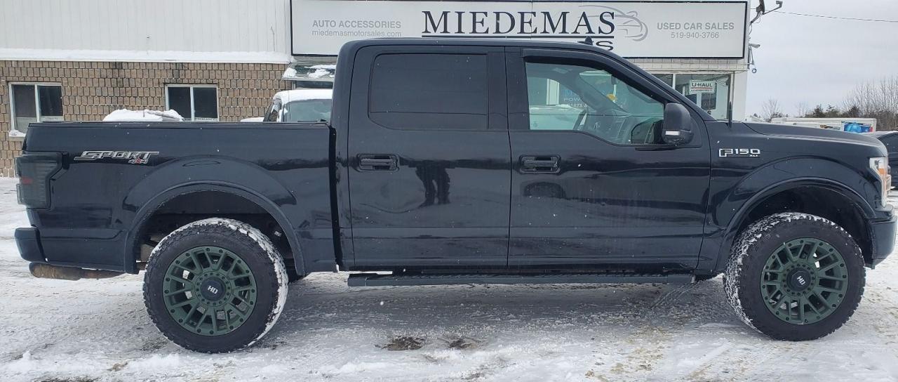 <p>Certified! Clean carfax! Fords ever reliable 5.0L V8 engine! Automatic transmission and 4x4 drivetrain. Heather leather seats to keep warm all winter long. Bluetooth, navigation and center console. Stylish aftermarket rims, antenna and loud exhaust- on purpose. Financing available. Price plus taxes and licensing.</p><p>3 year/ 70 000km Lubrico warranty with up to $4000 per eligible claim and $150 deductible available for only an additional $1795+HST</p><p class=MsoNormal>Miedemas has been selling quality used cars since 1973! Honest, professional and friendly staff with that small town feel. No pressure buying! Come see what it takes to keep customers coming for over 40years in business! Financing available on qualified units! Warranty available! All cars sold certified with oil changed and ready to go unless otherwise posted. We&rsquo;re here to help.</p>