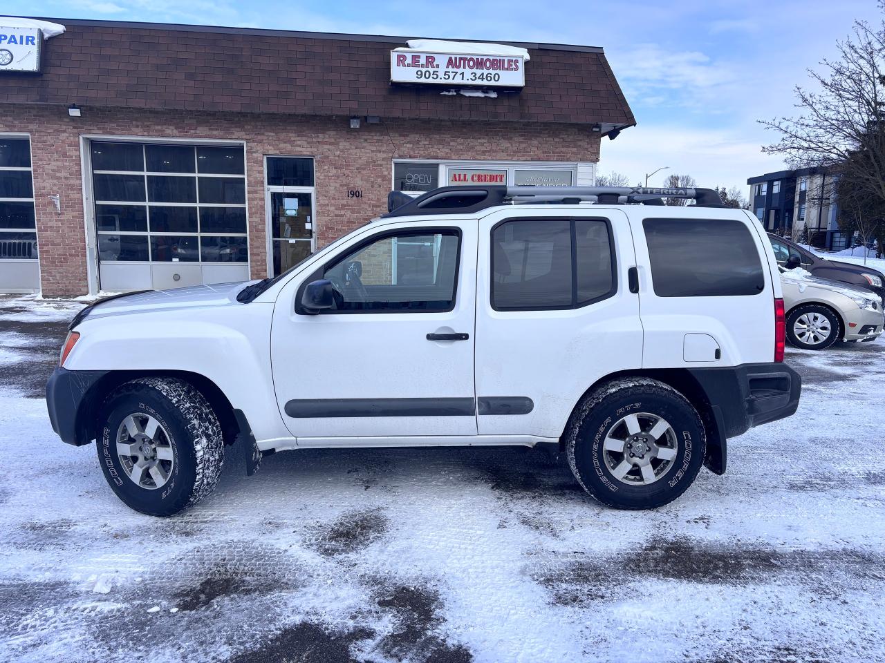 <p>Looking for adventure? Feast your eyes on this rugged 2012 Nissan Xterra PRO-4X, a rare find thats ready to conquer any terrain. This powerful SUV from R.E.R. Automobiles Ltd. is finished in a striking white and grey exterior, perfectly complemented by a durable grey interior. With just 142,990km on the odometer, this Xterra is primed for countless more adventures. This is a truck thats built to last.</p><p>This Xterra is equipped with a robust 4L 6-cylinder engine and a smooth automatic transmission, providing the power and control you need, whether youre navigating city streets or tackling off-road trails. The 4-wheel drive system ensures you can confidently take on challenging conditions. This PRO-4X model is a true off-road beast.</p><p>Here are five features that make this 2012 Nissan Xterra PRO-4X stand out:</p><ul><li><strong>Go-Anywhere Capability</strong>: The 4-wheel drive system means you can confidently go off-road.</li><li><strong>Rugged PRO-4X Trim</strong>: Ready for anything, with features designed for adventure.</li><li><strong>Powerful Engine</strong>: The 4L 6-cylinder engine delivers the muscle you need.</li><li><strong>Iconic Design</strong>: The Xterras unique SUV/Crossover style is always ready for adventure.</li><li><strong>Proven Reliability</strong>: This Xterra is ready for the long haul.</li></ul><p><strong><em>Powered by AutoIntelligence&trade;</em></strong> Vehicle information has been generated using artificial intelligence and is provided for informational purposes only. While efforts are made to ensure accuracy, please confirm all details directly with the dealer.</p><pre style=overflow-wrap: break-word; white-space: pre-wrap;>This vehicle is certified,  serviced & oil changed. Financing available O.A.C  <br><br><br>R.E.R. Automobiles Ltd. is a family owned business, established in 1994.<br><br>Referrals built us, reliability keep us serving you.<br><br>R.E.R. Automobiles Ltd. ... We Care.</pre>