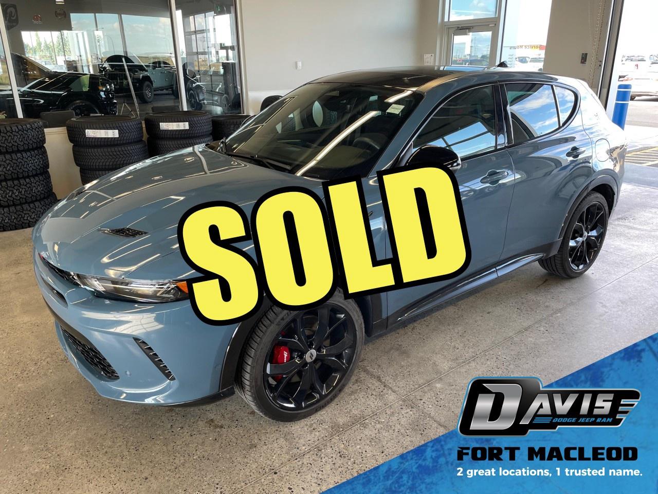 <p>Key Features:</p><ul><li><strong>Heated Front Seats</strong>: Stay warm and cozy during the colder months with heated front seats.</li><li><strong>Heated Steering Wheel</strong>: Enjoy the comfort of a heated steering wheel, perfect for chilly mornings.</li><li><strong>Keyless Entry</strong>: Access your vehicle effortlessly with keyless entry.</li><li><strong>Remote Start</strong>: Start your vehicle remotely, ensuring it's ready and comfortable when you are.</li><li><strong>Power Sunroof</strong>: Let in natural light and fresh air with the power sunroof.</li><li><strong>Hands Free Power Liftgate</strong>: Easily access the spacious cargo area with the hands-free power liftgate.</li><li><strong>Wireless Charging Pad</strong>: Keep your devices charged without the hassle of cords.</li><li><strong>Lane Keep Assist</strong>: Stay safe and centered on the road with lane keep assist.</li><li><strong>Surround View Camera</strong>: Gain a full perspective of your surroundings with the surround view camera.</li><li><strong>Park Assist</strong>: Effortlessly park your vehicle with advanced park assist technology.</li><li><strong>10 Uconnect Display</strong>: Enjoy seamless connectivity and control with the 10 Uconnect display featuring Apple CarPlay and Google Android Auto.</li><li><strong>Navigation</strong>: Get to your destination with ease using the integrated navigation system.</li><li><strong>Satellite Radio</strong>: Access a wide variety of entertainment options with satellite radio.</li><li><strong>R/T Black Top + Track Pack Bundle</strong>: Elevate your driving experience with the R/T Black Top and Track Pack bundle, adding sporty style and enhanced performance.</li><li><strong>Hybrid Electric</strong>: Experience full electric or a combination of power from engine for great fuelefficiency!</li></ul><p><strong>Why buy with<span style=color:#3498db>Davis Dodge</span>?</strong></p><ul><li><em>Friendly, no hassle sales professionals.</em></li><li><em>Delivery available.</em></li><li><em>Huge selection.</em></li><li><em>Small town feel, small town atmosphere.</em></li></ul><p><strong><span style=color:#3498db>Davis Dodge</span>,</strong><strong>where customers arefamily!</strong></p>