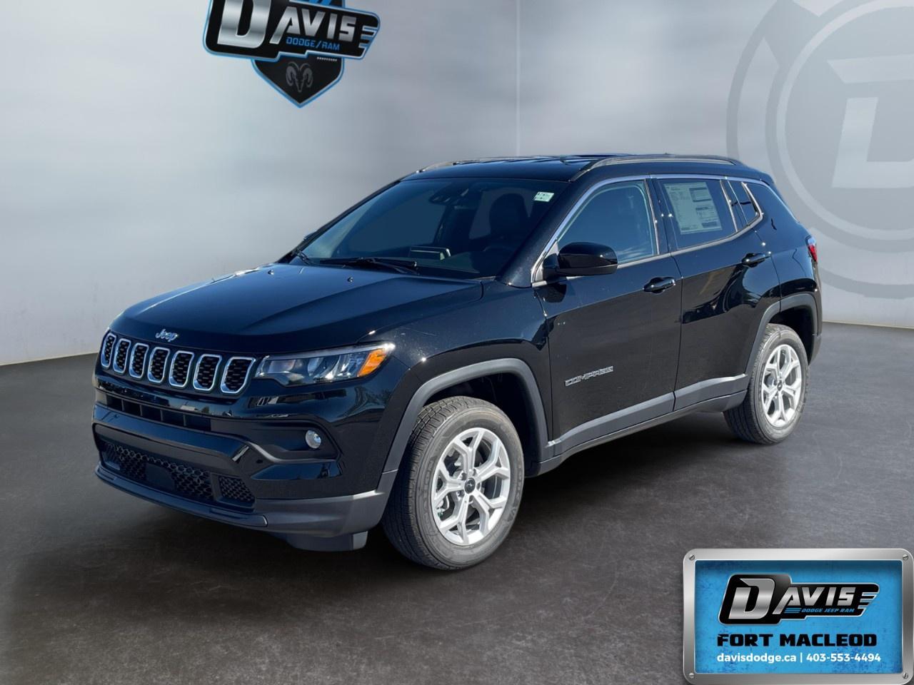 <p>Experience the 2026 Jeep Compass North 4x4 in elegant black, equipped for impeccable handling with its 4×4 drivetrain.</p><p><strong>Interior Features:</strong></p><ul><li>Premium black cloth/vinyl bucket seats for ultimate comfort</li><li>Heated front seats and steering wheel, ideal for Canadian winters</li><li>Leather steering wheel and gear shifter for a touch of luxury</li><li>Air conditioning to keep the cabin comfortable year-round</li></ul><p><strong>Exterior Features:</strong></p><ul><li>Diamond Black Crystal Pearl color complementing its suv body type</li><li>Wheels: 17" x 7" aluminum adding a stylish edge</li><li>Heated mirrors to ensure clear visibility during chilly mornings</li><li>Alloy wheels enhancing the vehicle's appearance and performance</li></ul><p><strong>Technology & Safety Features:</strong></p><ul><li>8-Speed Automatic Transmission and Turbocharged 2.0L Engine for smooth and powerful drives</li><li>Backup camera and Bluetooth connection for ease of travel</li><li>Adaptive cruise control for modern driving convenience</li><li>Keyless entry and remote start for added security and comfort</li><li>Lane assist and brake assist prioritized for safety</li><li>Satellite radio and smart device integration for endless entertainment options</li><li>Wi-Fi hotspot keeping you connected on the go</li></ul><p>This stylish and feature-packed SUV is perfect for adventurous families looking for reliability and comfort. Contact Davis Dodge Fort Macleod today to learn more about this outstanding vehicle and how it can be yours!</p>