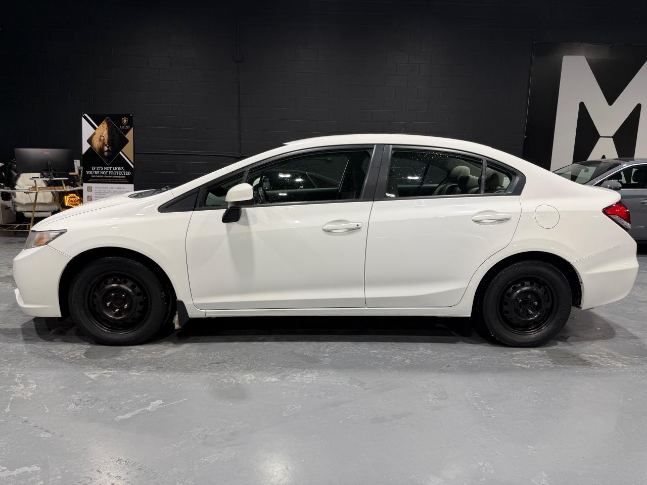 2013 Honda Civic 4dr Auto LX Photo