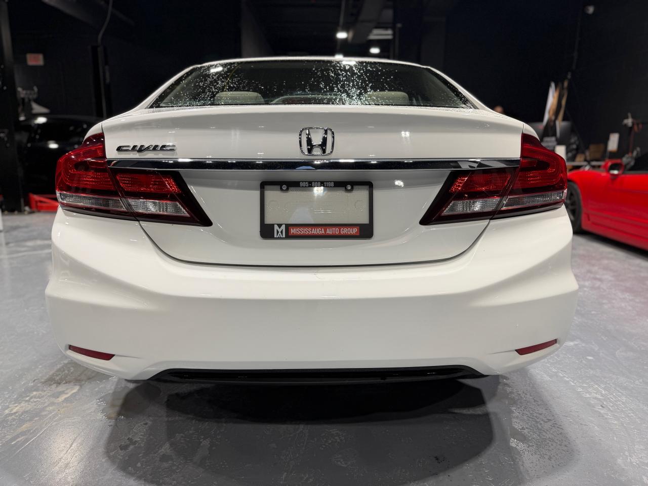 2013 Honda Civic 4dr Auto LX Photo