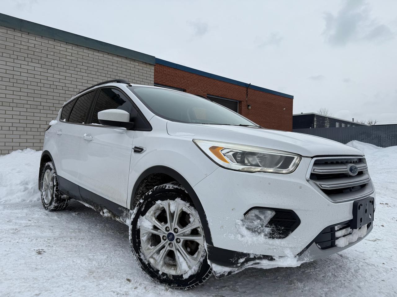 <p>**SAFETY INCLUDED**SEL AWD!**FINANCING AVAILABLE**WARRANTY AVAILABLE**</p><p>2018 FORD ESCAPE SEL AWD FOR SALE! BEAUTIFUL TRUCK READY FOR CANADIAN WINTERS, WITH TONS OF PREVIOUS SERVICE! THIS ESCAPE INCLUDES 18 SEL ALLOY RIMS ON WINTER TIRES, CLEAN WHITE EXTERIOR, PRISTINE BLACK LEATHER INTERIOR, 2 KEYS, REAR VIEW CAMERA, APPLE CAR PLAY, BLUETOOTH, MULTI-ZONE CLIMATE WITH AC, HEATED SEATS, POWER TRUNK AND MUCH MORE!! THIS VEHICLE IS BEING SOLD CERTIFIED WITH A SAFETY STANDARDS CERTIFICATE FOR THE CHEAP CHEAP<br>PRICE OF $10,799 + TAX AND LICENSING! 6 MONTH WARRANTY INCLUDED! FINANCING AVAILABLE!&nbsp;<br>*****BY APPOINTMENT ONLY*****<br>*****PLEASE CALL 647-862-7904 TO BOOK APPOINTMENT*****</p><p>Auto Resale Inc&nbsp;<br>56 Martin Ross Ave&nbsp;<br>North York, ON M3J 2L4&nbsp;<br>647-862-7904</p>