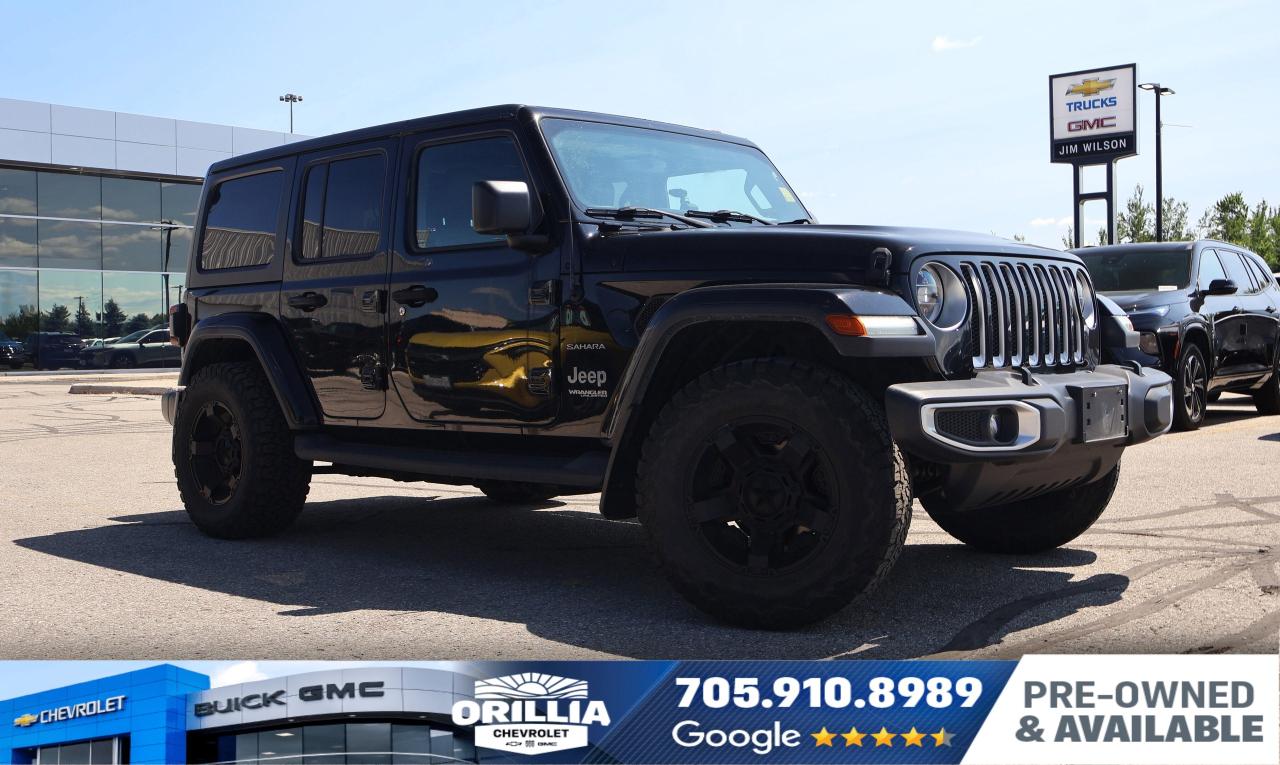 Bold, rugged, and engineered for adventurers, the 2018 Jeep Wrangler Unlimited Sahara blends legendary off-road capability with modern refinement, making it a perfect match for life in Orillia and the exhilarating landscapes of Simcoe County, Cottage Country, and Lake Country.

Under its iconic exterior, the Sahara is powered by a 3.6L Pentastar V6 engine paired with an 8-speed automatic transmission and a Selec-Trac full-time 4WD system. This combination delivers smooth, confident performance---whether youre navigating city streets or exploring rustic lake trails. The engines Active Fuel Management and Stop/Start technologies enhance efficiency, especially during stop-and-go driving.

Adventure-ready from the start, this Wrangler features a Dana M200 rear axle, anti-spin differential, and hill descent control, ensuring every off-road path is met with unwavering control. Its LED lighting group---including headlights, fog lamps, and taillamps---enhances visibility and adds a modern edge to its bold styling. The Cold Weather Group, which includes heated front seats and a heated steering wheel, ensures comfort even during chilly cottage mornings.

Inside, the Sahara Unlimited offers a refined take on ruggedness: black leather-faced seats with Sahara logos, a leather-wrapped steering wheel, shift knob, and parking brake handle. The cabin is packed with upscale touches like the Alpine premium audio system, Uconnect 4C NAV on an 8.4 touchscreen, HD Radio, SiriusXM Traffic and Travel Link, and a USB-enabled infotainment experience---all designed to blend comfort with function.

Built for practicality, youll find conveniences such as a remote proximity keyless entry, remote start, power liftgate, running boards, conventional spare tire, and tow hooks---perfect for weekend lake runs or hauling gear through Cottage Country.

Safety and entertainment go hand in hand with features like back-up camera, cross-traffic alert, blind spot monitoring, stability and traction control, and a full suite of airbags. Ideal for families and road-trippers alike.

This Midnight-painted Sahara currently sits 10,593 kilometers below market average, offering exceptional value and readiness for exploration in Lake Country and beyond.

Experience it firsthand with a VIP test drive at Orillia Chevrolet. With clear, all-in pricing---just add tax and licensing---there are no hidden fees. The 2018 Jeep Wrangler Unlimited Sahara isnt just an SUV---its a lifestyle, made for Ontarios most thrilling drives.
