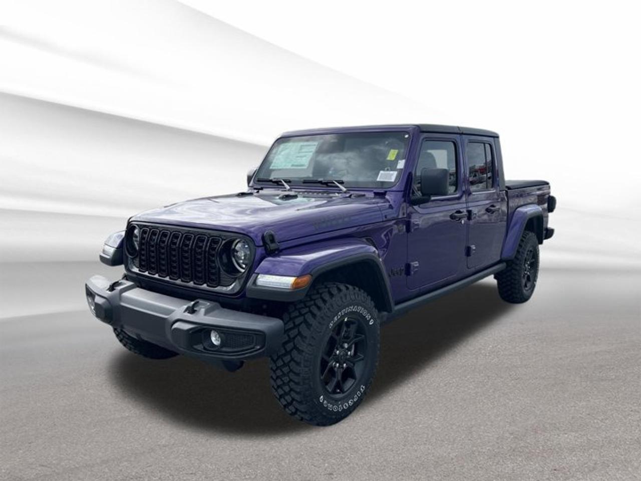 Meet the brand new 2026 Jeep Gladiator Willys, now at Steele Halifax Chrysler Dodge Jeep Ram FIAT in Halifax. Finished in Reign with a Black interior, this 4-door truck blends open-air Jeep freedom with real pickup utility. With its automatic transmission and 4-wheel drive, it is built for confident year-round driving in Nova Scotia.Under the hood, the 2026 Jeep Gladiator Willys uses a 3.6 L regular unleaded V6 gas engine. Power delivery is smooth and familiar, and the automatic transmission keeps daily driving easy in traffic, on the highway, or when the weather turns. This is a truck that feels ready for workdays, weekends, and everything between.For towing and hauling, this Gladiator Willys is equipped with a Trailer Hitch, giving you the right starting point for pulling a utility trailer or bringing extra gear along. When winter hits, the Heated Steering Wheel adds comfort you will appreciate on cold mornings, while the Rear Window Defroster helps keep rear visibility clear in damp or frosty conditions. The Auto-Dimming Rearview Mirror reduces glare from headlights behind you, helping you stay relaxed on night drives.At Steele Halifax Chrysler Dodge Jeep Ram FIAT, we know many buyers want a truck that is simple to live with and easy to enjoy. This brand new 2026 Jeep Gladiator Willys focuses on the essentials: proven V6 power, 4-wheel-drive traction, and smart comfort features that make daily use better without overcomplicating the drive.TRUCK FEATURESTrailer hitch ready for towing tasksFour-door cab for easy accessPickup bed supports weekend haulingFour-wheel drive for tough conditionsADVANCED SAFETY FEATURESRearview mirror dims glare automaticallyRear window defroster aids visibilityFour-wheel drive improves poor-weather controlClear rear view helps night drivingPERFORMANCE AND EFFICIENCY3.6 L V6 gas engine powerRegular unleaded fuel for simpler fill-upsAutomatic transmission for smooth shiftingFour-wheel drive traction for varied roadsCOMFORT AND CONVENIENCEHeated steering wheel for cold morningsAuto-dimming mirror reduces night glareRear window defroster clears fog fasterFour doors for easier entryTECHNONOLGY AND CONNECTIVITYAuto-dimming mirror uses light-sensing techSimple automatic transmission operation dailyRear defroster control for quick clearingModern truck layout for easy reachCARGO SPACEPickup bed for bulky gear loadsTrailer hitch supports added carrying optionsFour-door layout keeps cabin usableTruck design suits work and playWHAT OTHER OWNERS LIKEConfident four-wheel drive in bad weatherV6 power for everyday versatilityPractical truck bed for real utilityEasy driving with automatic transmissionThis 2026 Jeep Gladiator Willyss VIN is: 1C6PJTAG5TL161818.