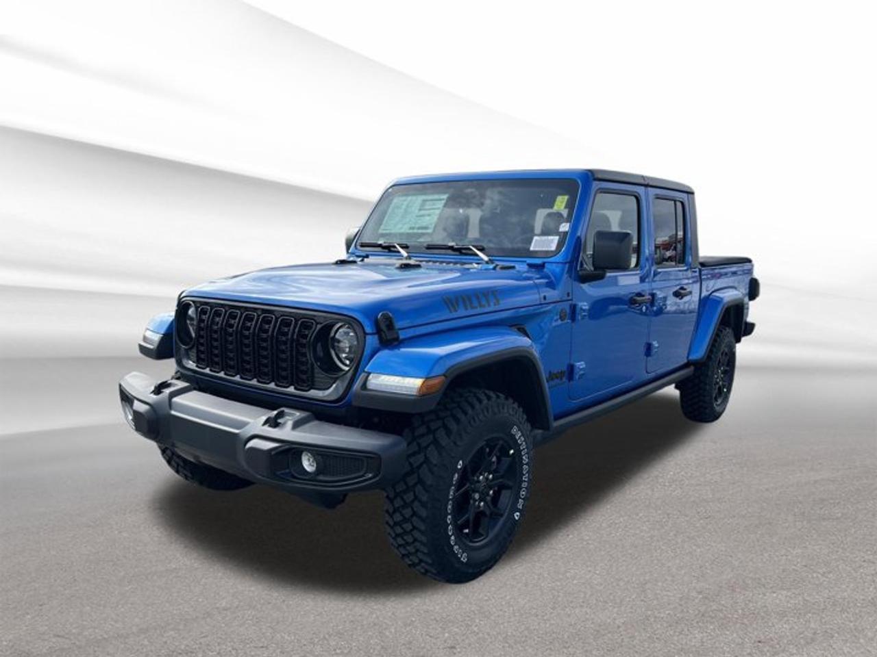 Meet the brand new 2026 Jeep Gladiator Willys, now available at Steele Halifax Chrysler Dodge Jeep Ram FIAT in Halifax. Finished in blue with a black interior, this 4-door truck brings open-air Jeep freedom together with real pickup utility. With an automatic transmission, 4-wheel drive, and a 3.6 L regular unleaded V6 gas engine, its built for daily driving, weekend trails, and year-round Atlantic Canada weather.The 2026 Jeep Gladiator Willys is a smart fit if you want one vehicle that can do it all. It has the confident stance and practical bed you expect from a truck, plus the go-anywhere attitude Jeep owners love. And with key comfort touches like a heated steering wheel and an auto-dimming rearview mirror, its ready for Halifax commutes in every season.TRUCK FEATURESTrailer hitch ready for towing tasksPickup bed for bulky, messy gearFour doors for easier crew accessFour-wheel drive for tough conditionsADVANCED SAFETY FEATURESAuto-dimming mirror reduces night glareClear rear visibility with defrosterFour-wheel drive adds control on snowStrong braking feel with V6 powerPERFORMANCE AND EFFICIENCY3.6 L V6 gas engine powerAutomatic transmission for smooth shiftingFour-wheel drive for added tractionRegular unleaded fuel for easy fill-upsCOMFORT AND CONVENIENCEHeated steering wheel for cold morningsRear window defroster clears winter fogFour-door cabin for easier entryAuto-dimming mirror eases night drivingTECHNONOLGY AND CONNECTIVITYDriver-friendly controls within easy reachClear gauges for quick at-a-glance checksAutomatic transmission simplifies stop-and-go trafficMirror dimming adapts to changing lightCARGO SPACETruck bed supports weekend project loadsEasy-to-clean space for outdoor gearFour-door layout helps carry passengersPractical storage for daily essentialsWHAT OTHER OWNERS LIKEConfident four-wheel drive in bad weatherUseful truck bed for real tasksStrong V6 feel on highwaysComfortable winter driving with heated wheelThis 2026 Jeep Gladiator Willyss VIN is: 1C6PJTAG3TL161817.
